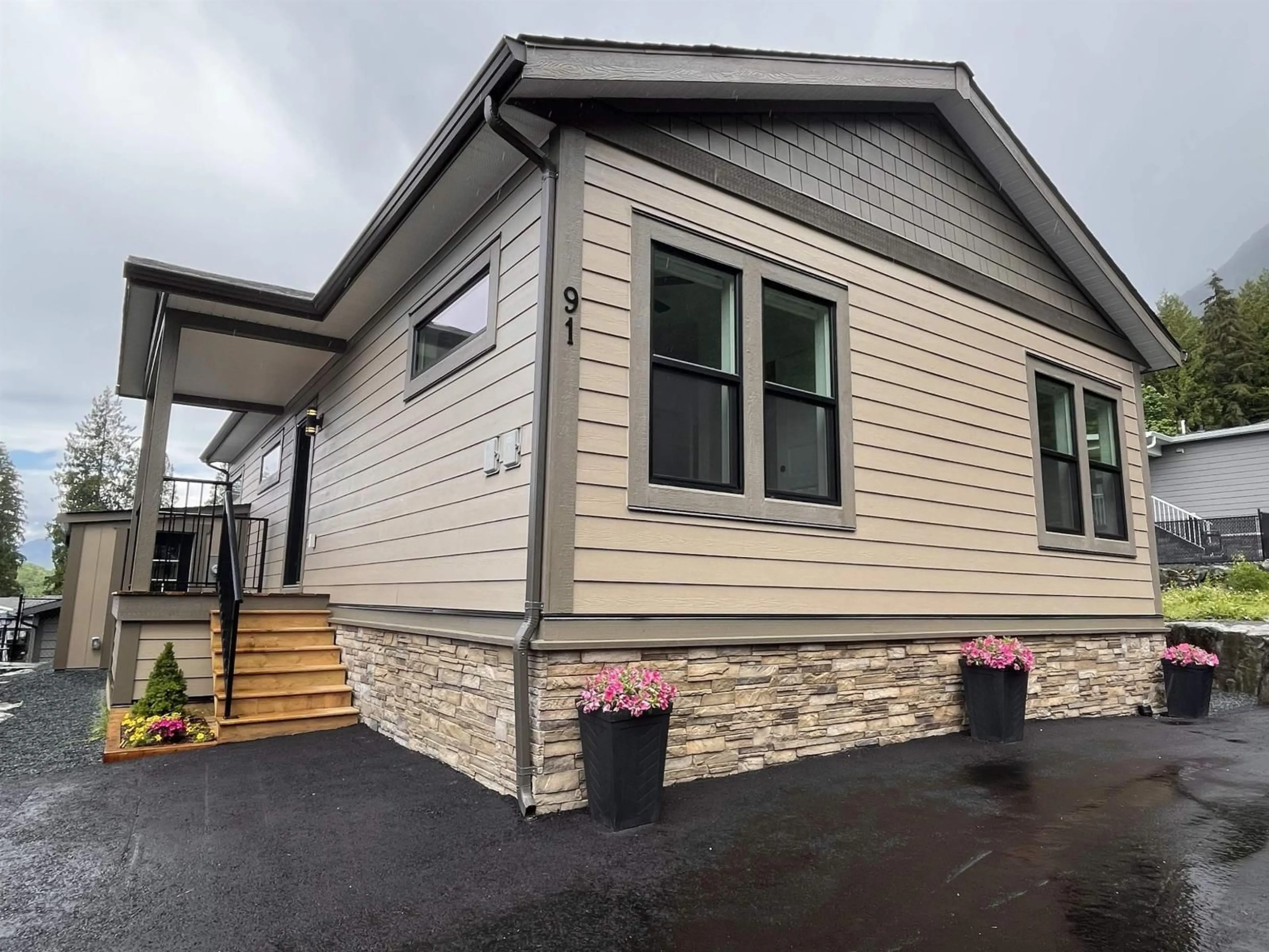 Home with vinyl exterior material, street for 91 - 53480 BRIDAL FALLS ROAD, Chilliwack British Columbia V0X1X1