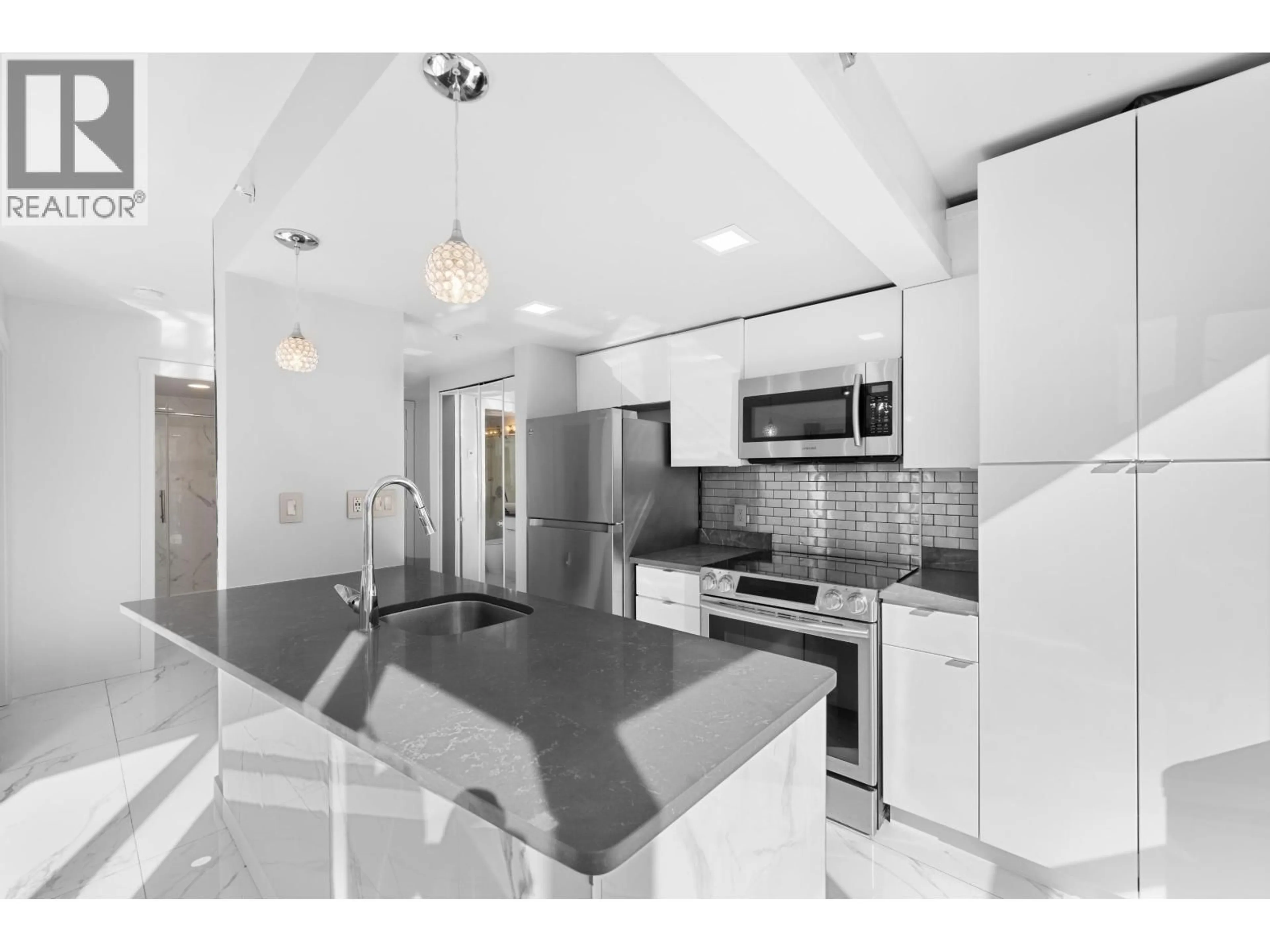 Open concept kitchen, ceramic/tile floor for 702 - 1188 HOWE STREET, Vancouver British Columbia V6Z2S8