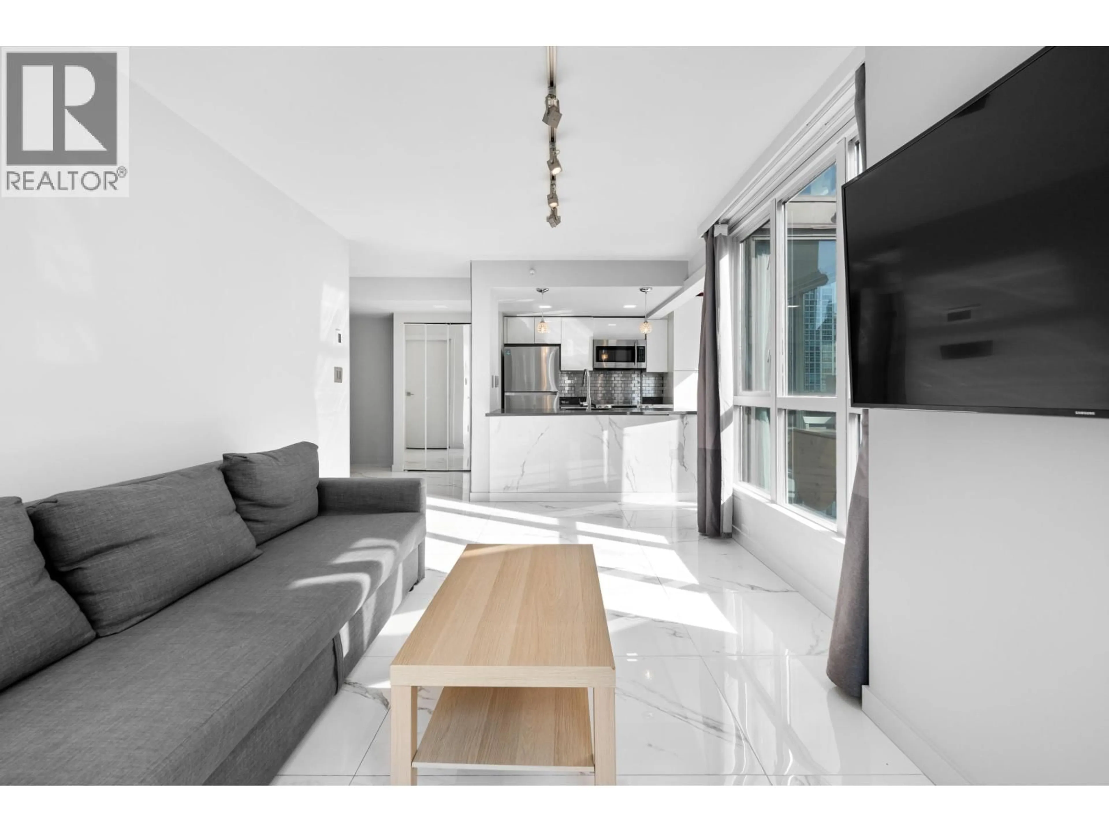 Living room with furniture, unknown for 702 - 1188 HOWE STREET, Vancouver British Columbia V6Z2S8