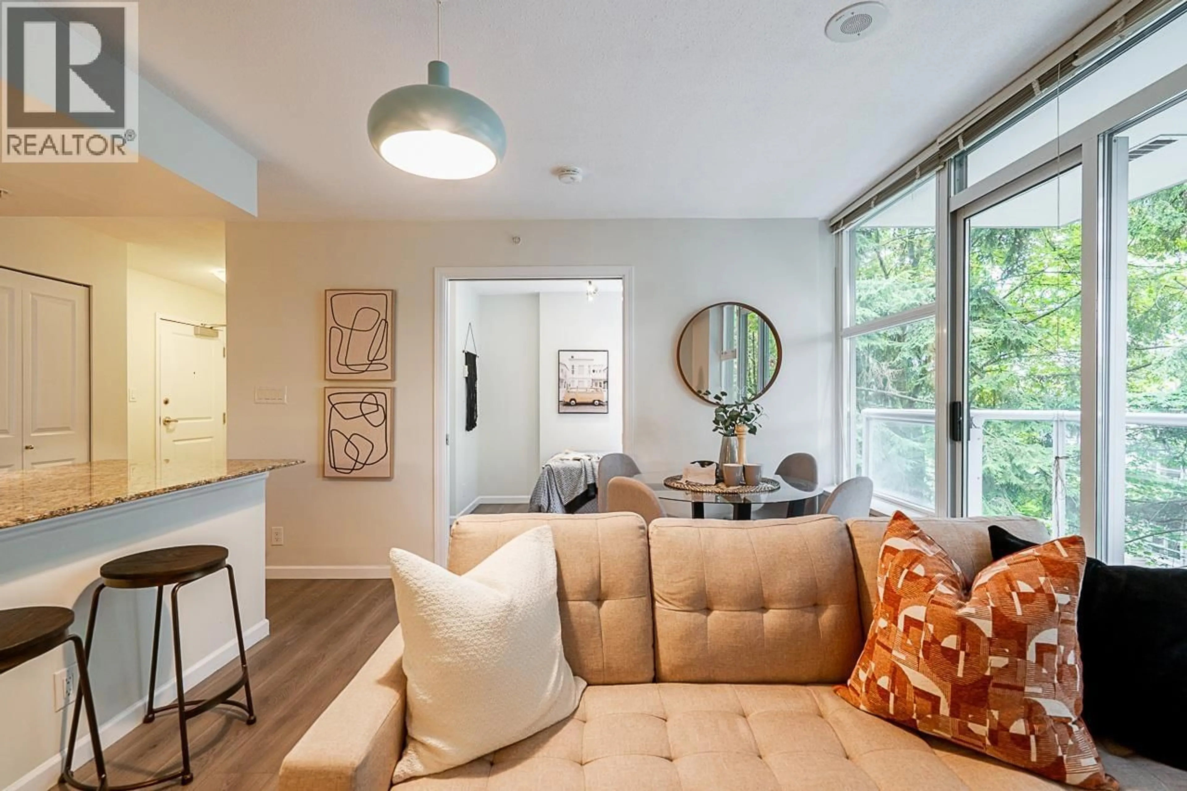 Living room with furniture, unknown for 311 - 9262 UNIVERSITY CRESCENT, Burnaby British Columbia V5A0A4