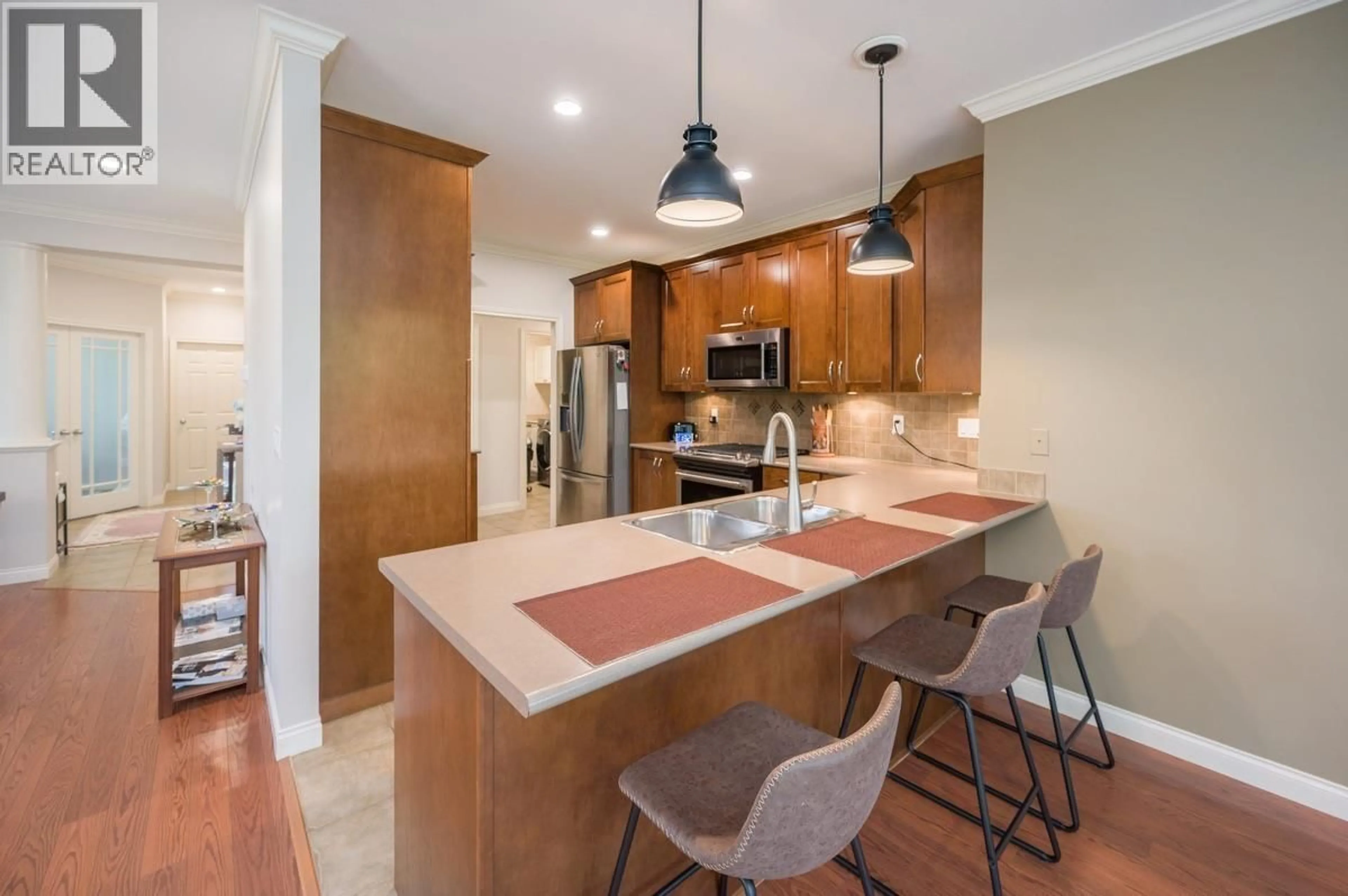 Open concept kitchen, ceramic/tile floor for 1 - 6105 RIVER ROAD, Delta British Columbia V4K5G5