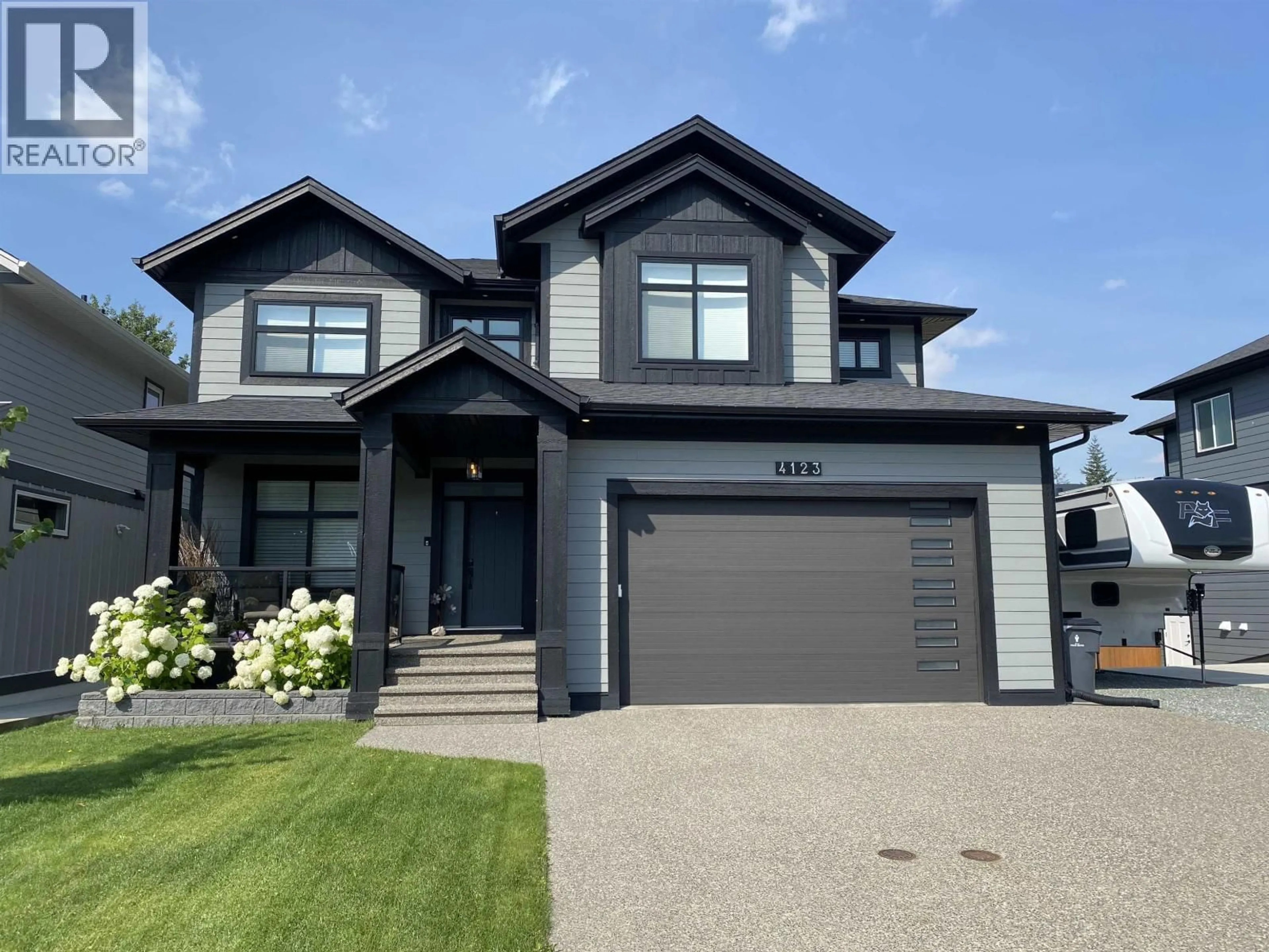 Home with vinyl exterior material, street for 4123 ZANETTE PLACE, Prince George British Columbia V2K0B1