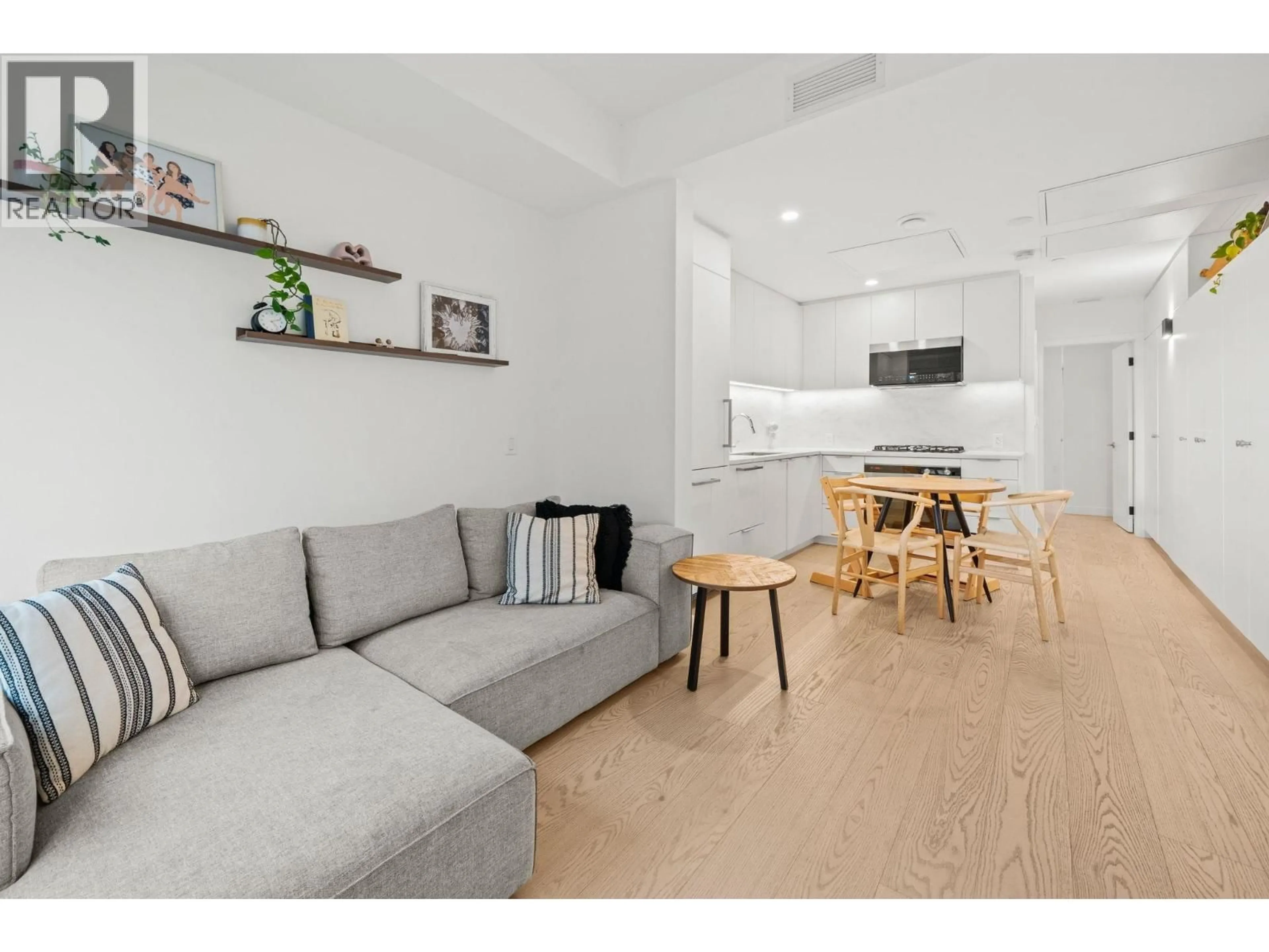 Living room with furniture, unknown for 107 - 650 2ND STREET, North Vancouver British Columbia V7L1E3