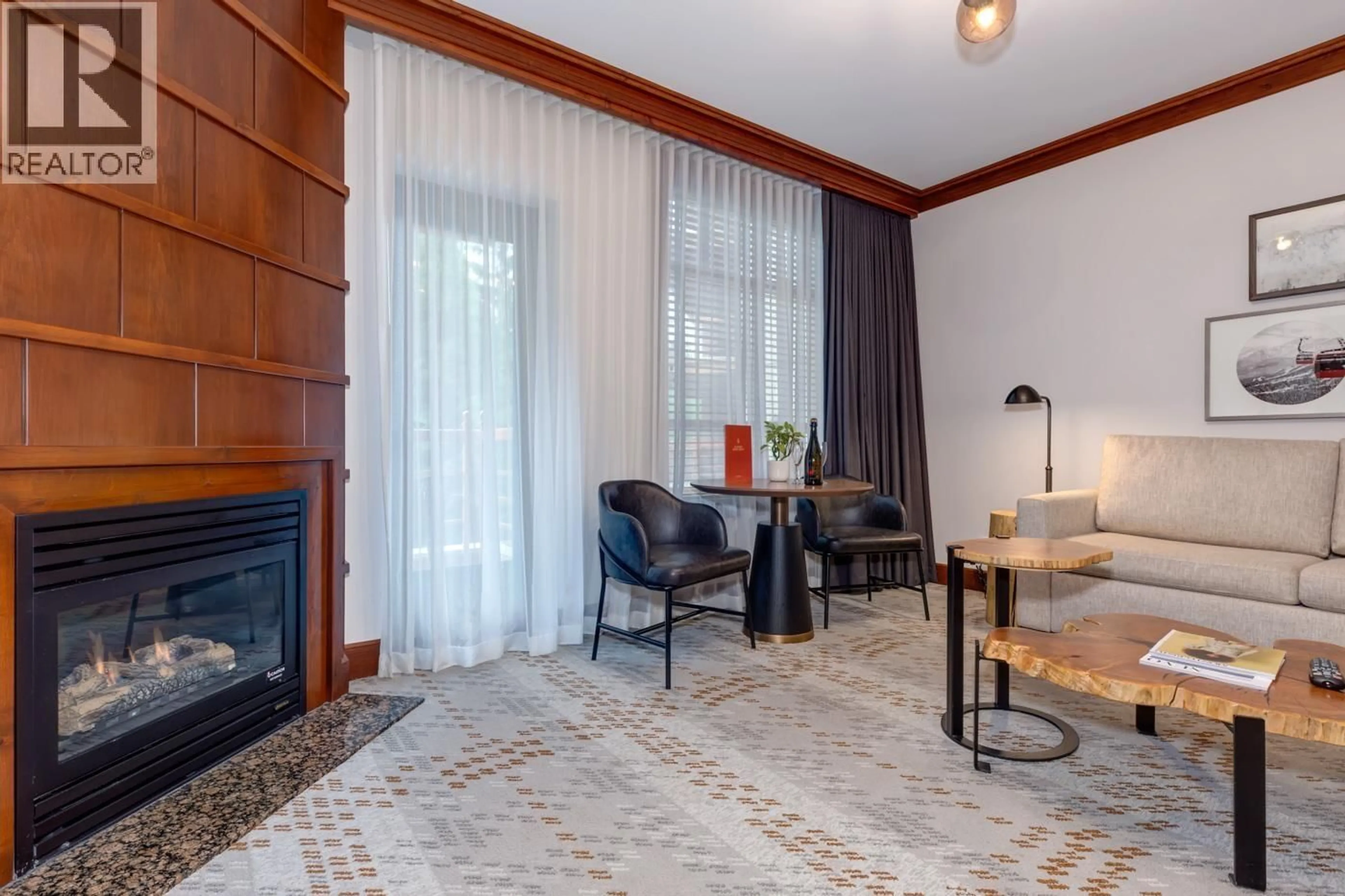 Living room with furniture, unknown for 417 - 4591 BLACKCOMB WAY, Whistler British Columbia V8E0Y4