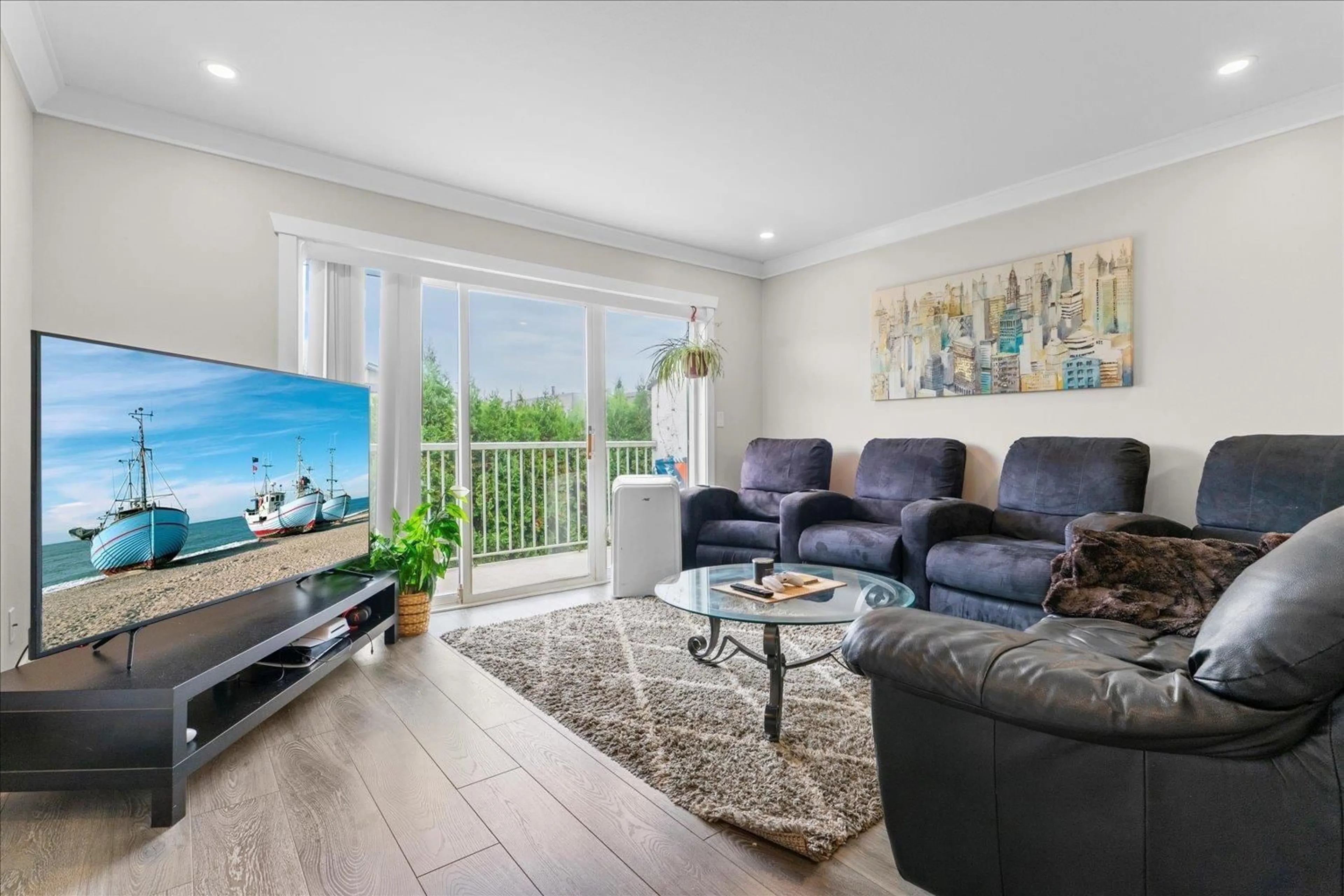 Living room with furniture, wood/laminate floor for 207 - 45669 MCINTOSH DRIVE, Chilliwack British Columbia V2P6V4