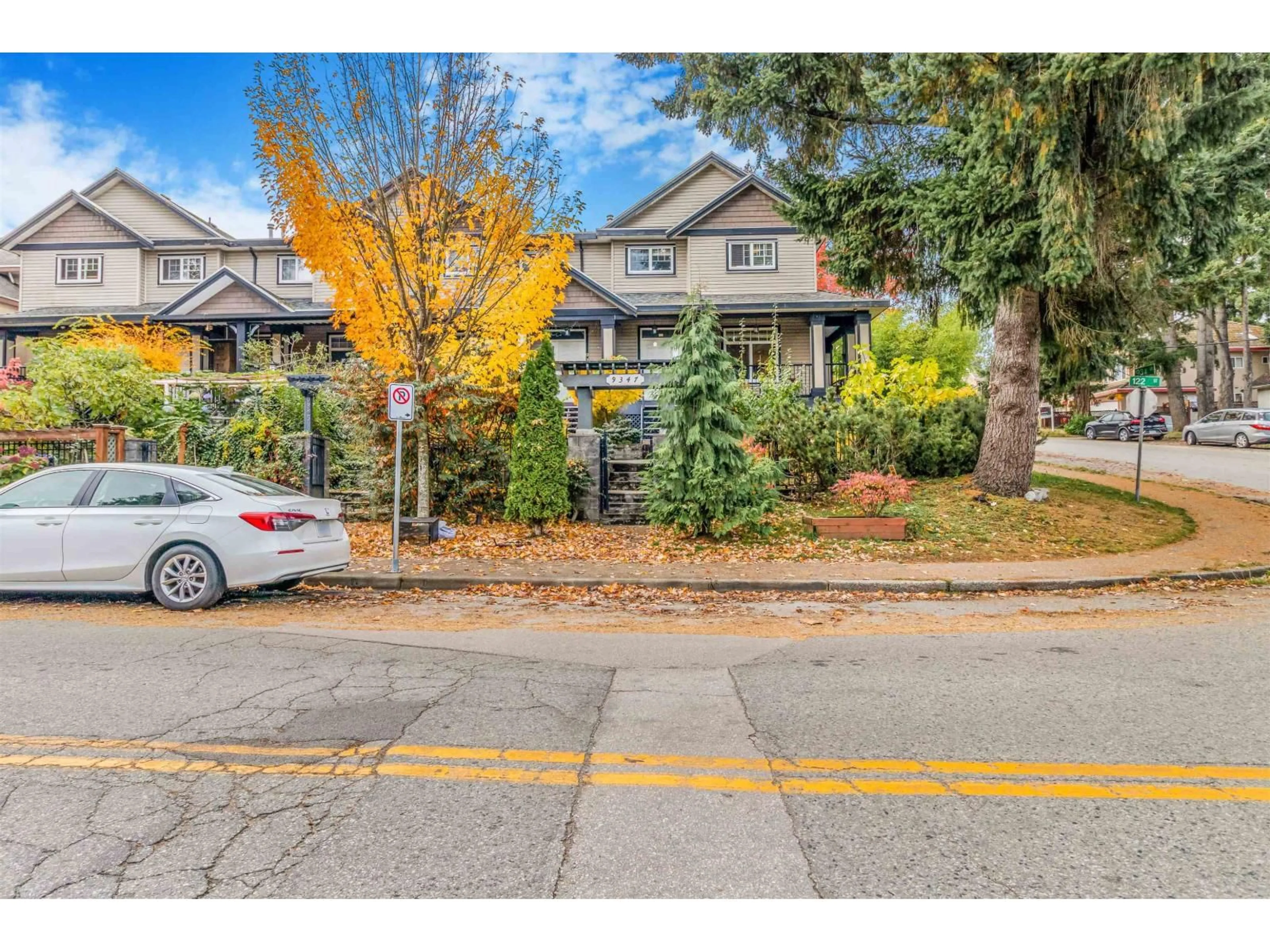 A pic from outside/outdoor area/front of a property/back of a property/a pic from drone, street for 9347 122, Surrey British Columbia V3V4L7