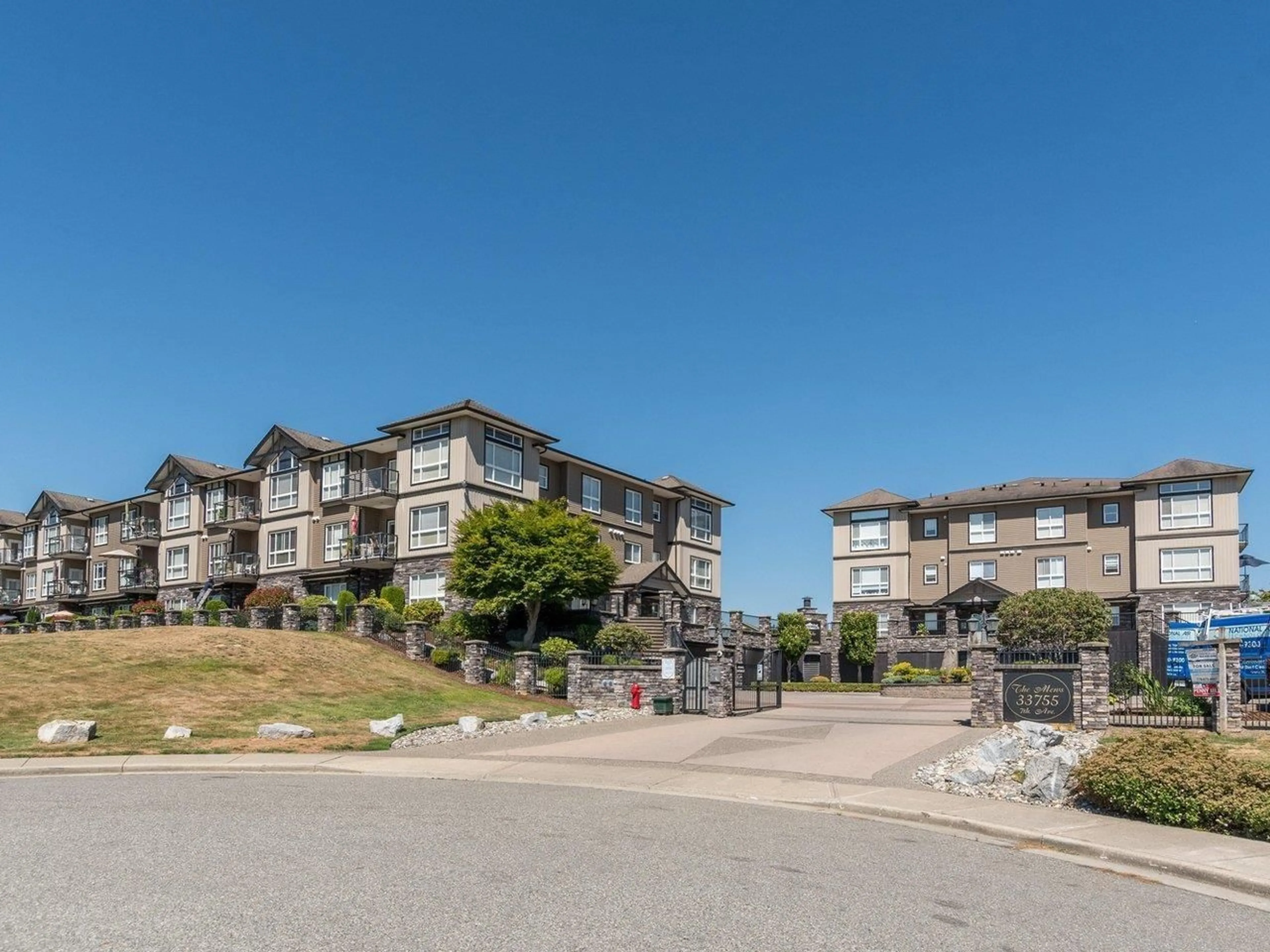 A pic from outside/outdoor area/front of a property/back of a property/a pic from drone, mountain view for 307 - 33755 7TH, Mission British Columbia V2V0A4