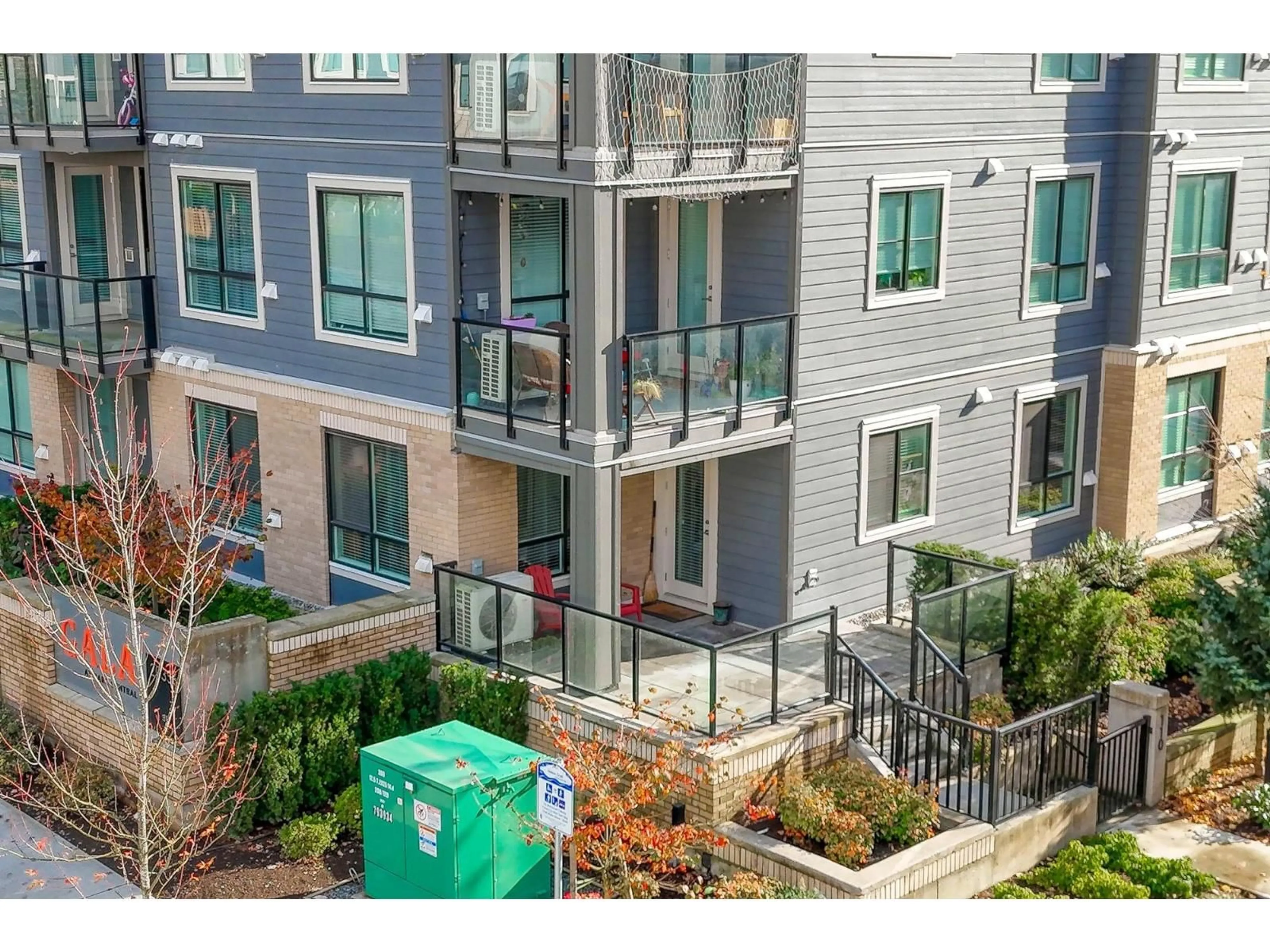 A pic from outside/outdoor area/front of a property/back of a property/a pic from drone, city buildings view from balcony for 110 - 20356 72B, Langley British Columbia V2Y4J9