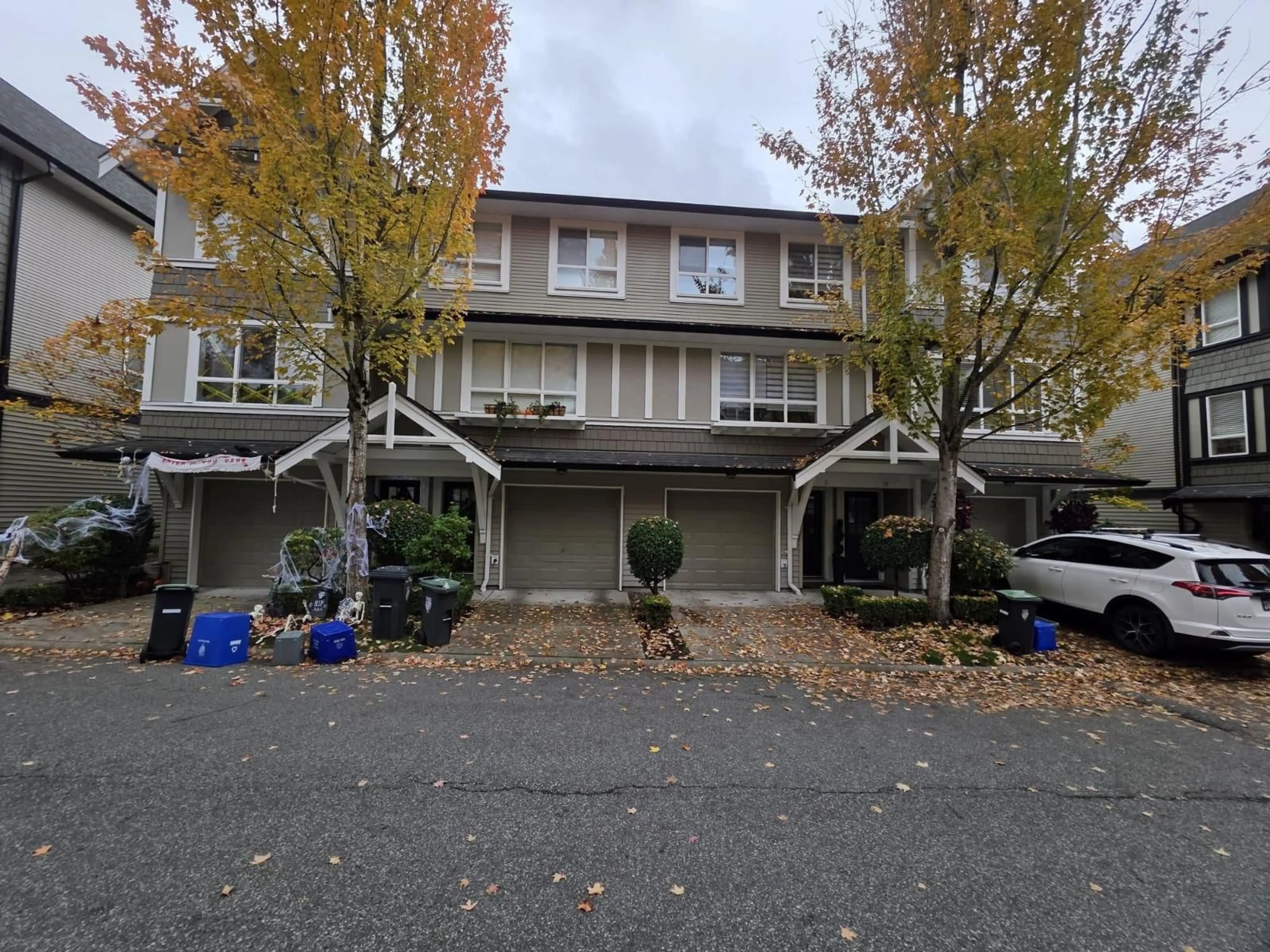 A pic from outside/outdoor area/front of a property/back of a property/a pic from drone, street for 9 - 6747 203, Langley British Columbia V2Y3B5