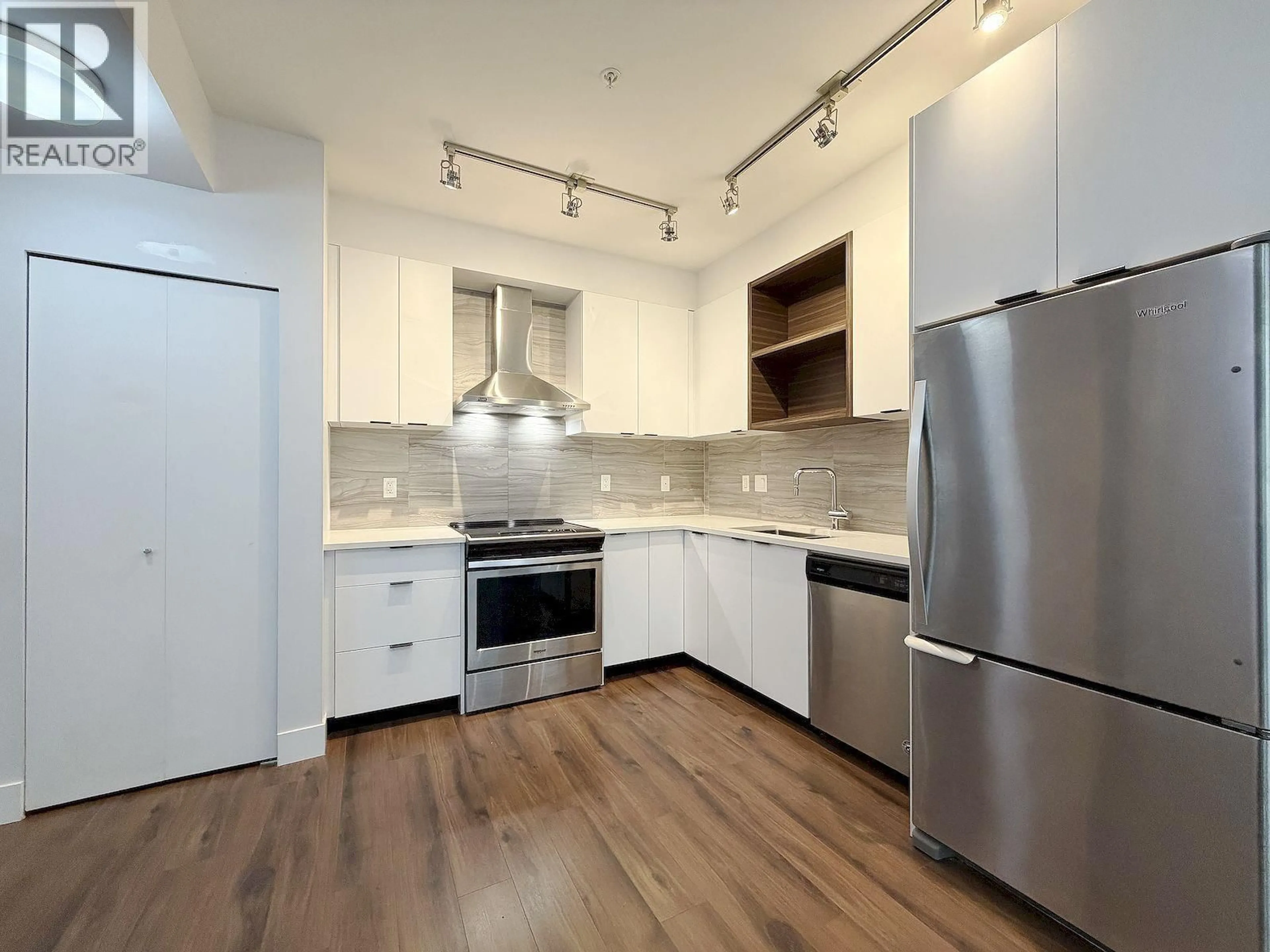 Open concept kitchen, unknown for 242 - 5355 LANE STREET, Burnaby British Columbia V5H0H1