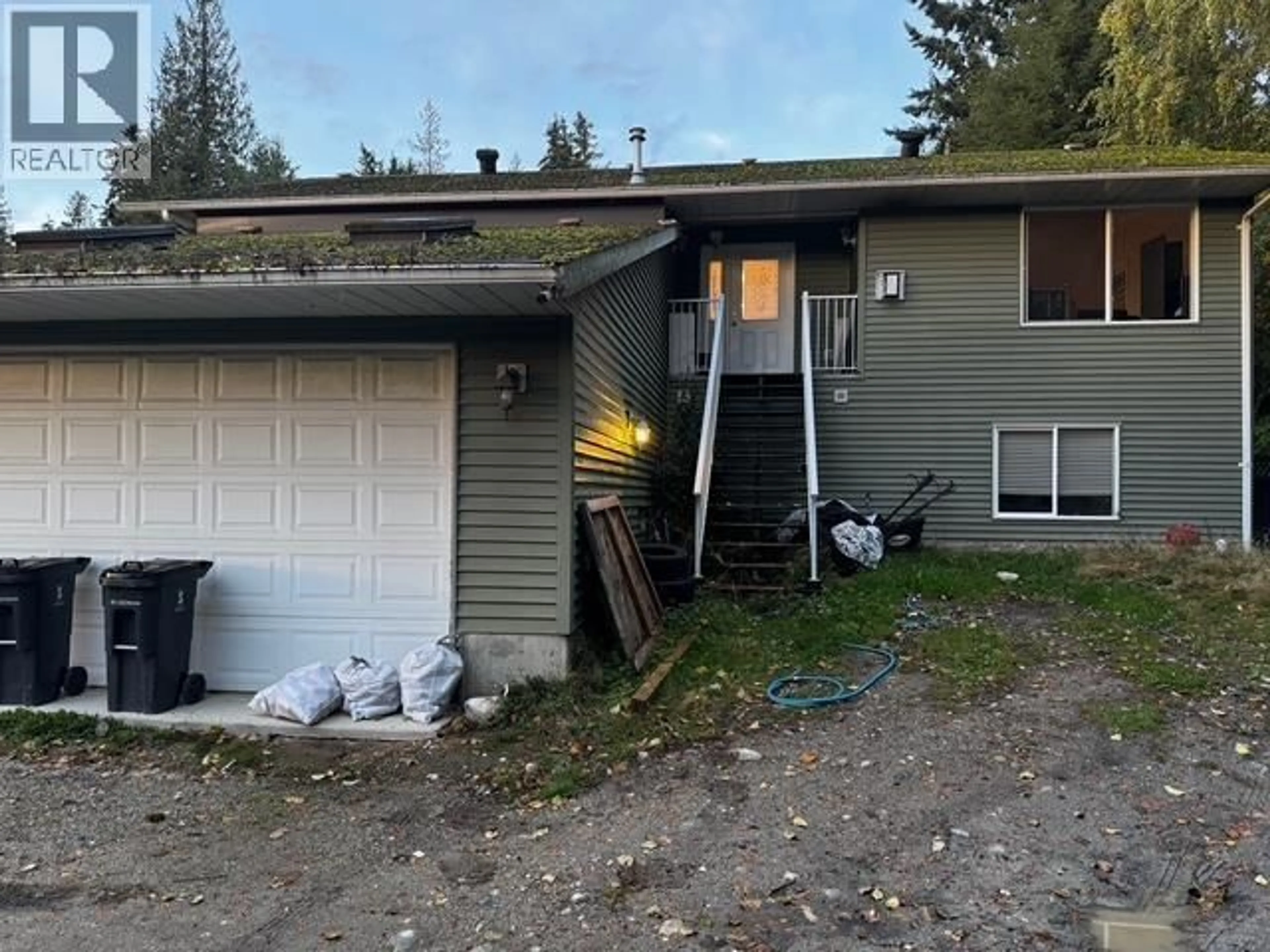 A pic from outside/outdoor area/front of a property/back of a property/a pic from drone, street for 6300 SAMRON ROAD, Sechelt British Columbia V2C1Y1