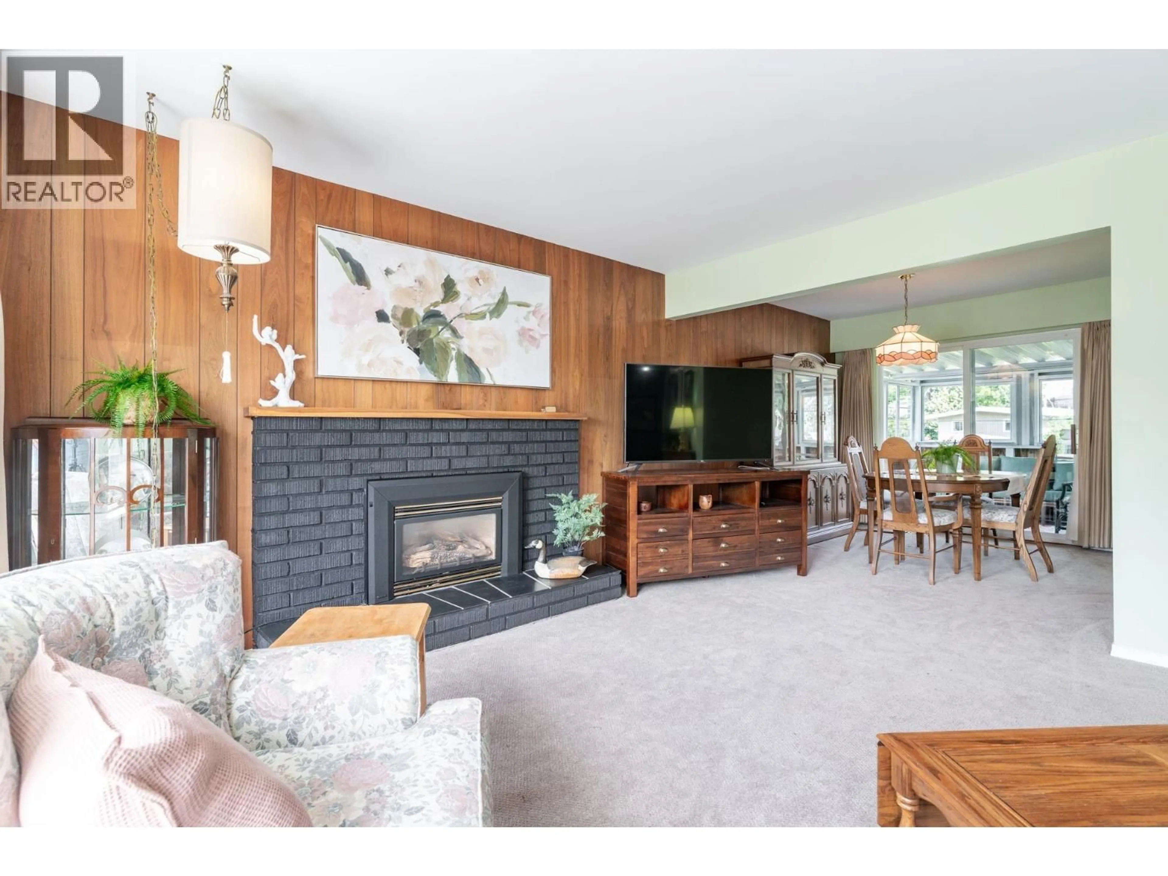 Living room with furniture, wood/laminate floor for 5451 7B AVENUE, Delta British Columbia V4M1S7