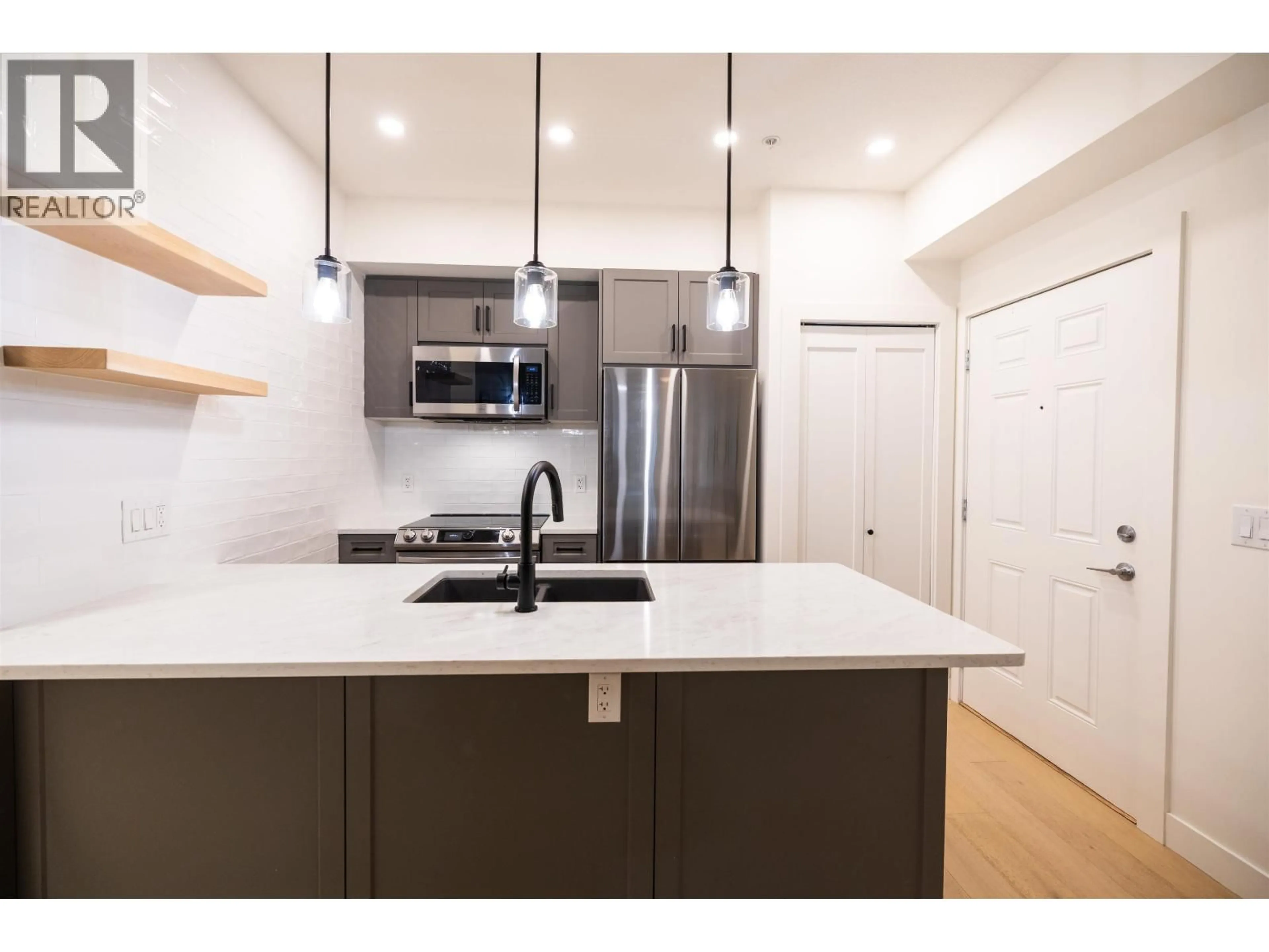 Open concept kitchen, unknown for 110 - 12040 222 STREET, Maple Ridge British Columbia V2X9G8