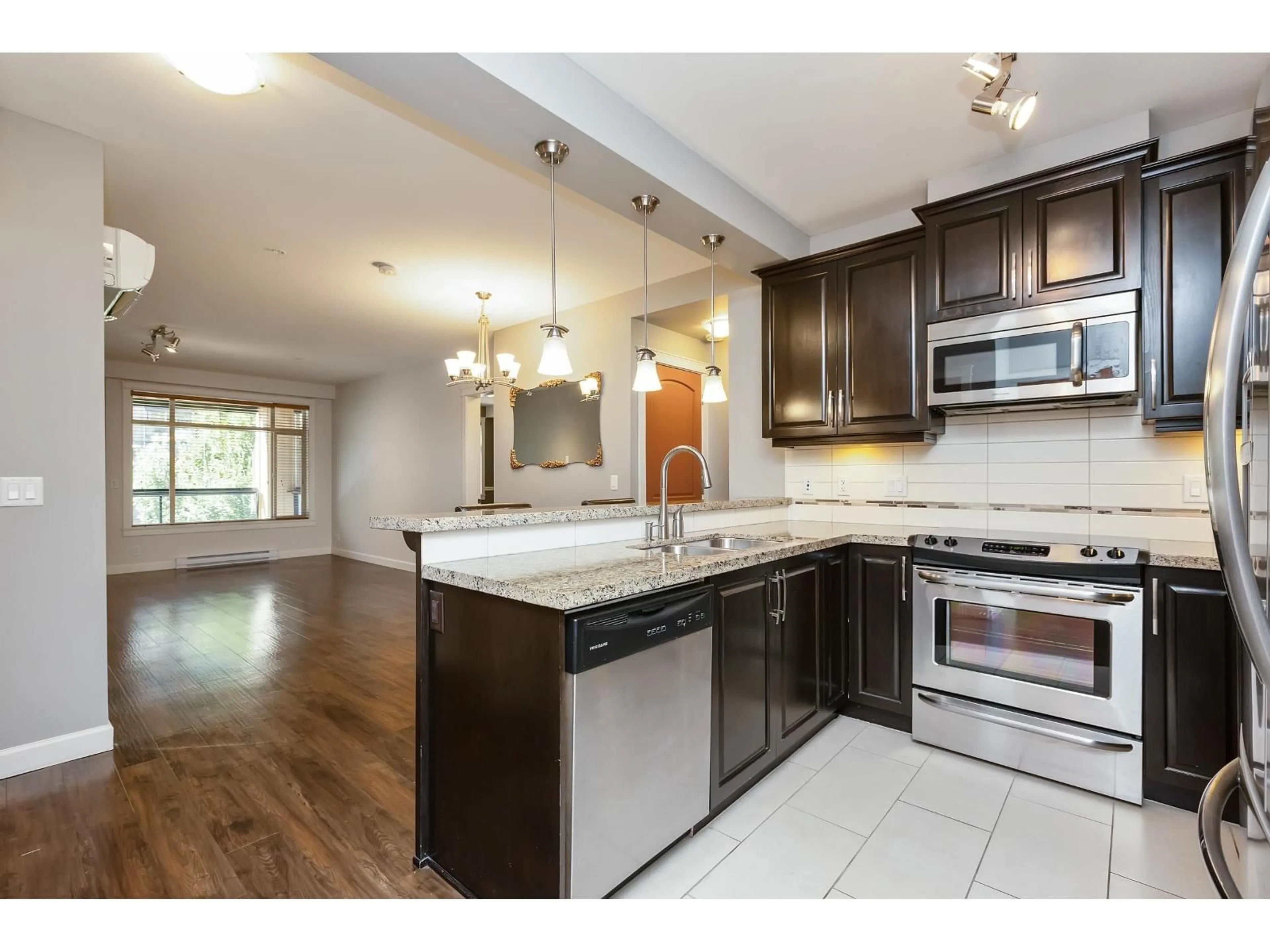 Open concept kitchen, unknown for 429 - 8288 207A, Langley British Columbia V2Y0L2