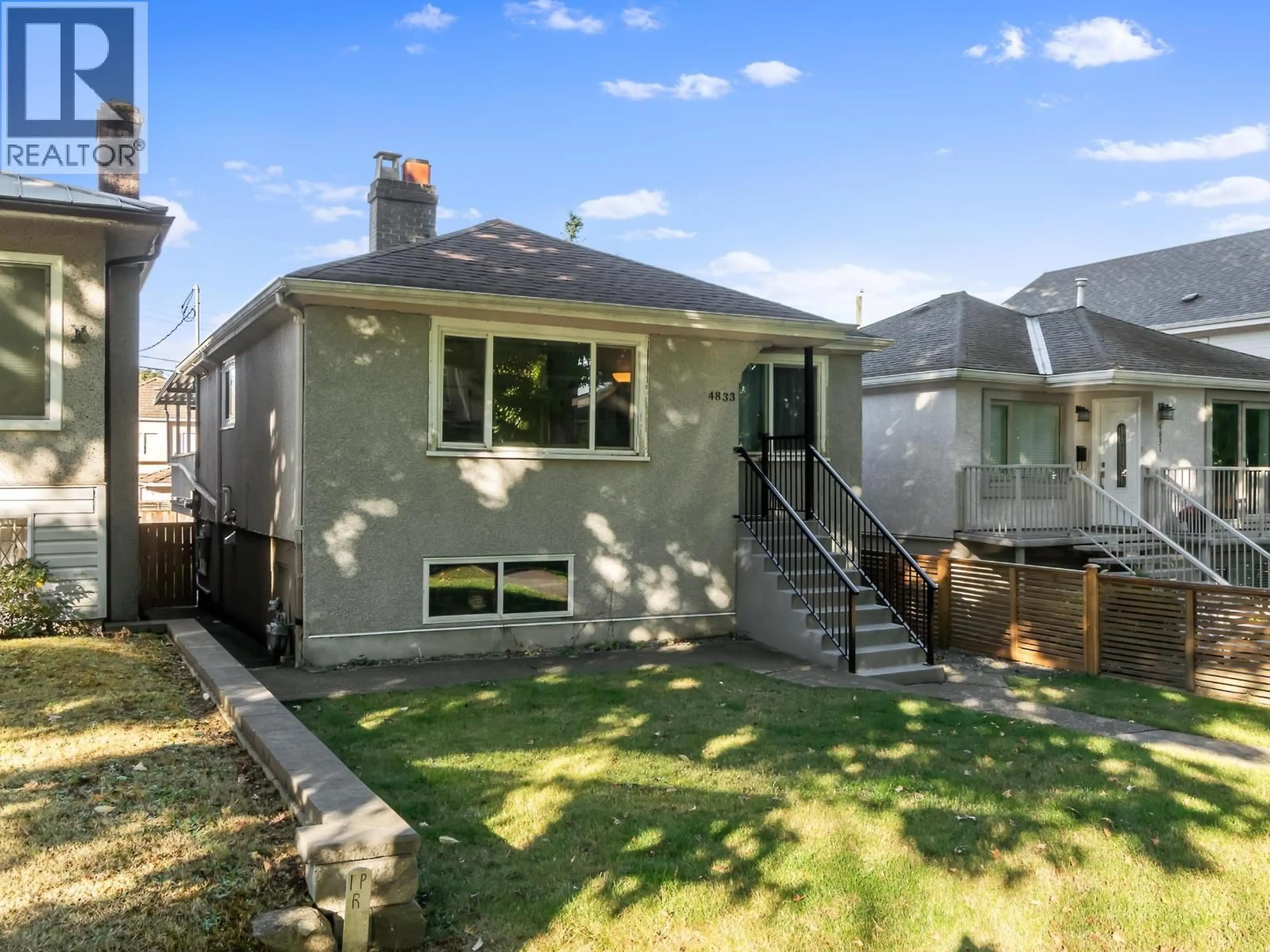 Home with vinyl exterior material, street for 4833 HENRY STREET, Vancouver British Columbia V5V4Z2