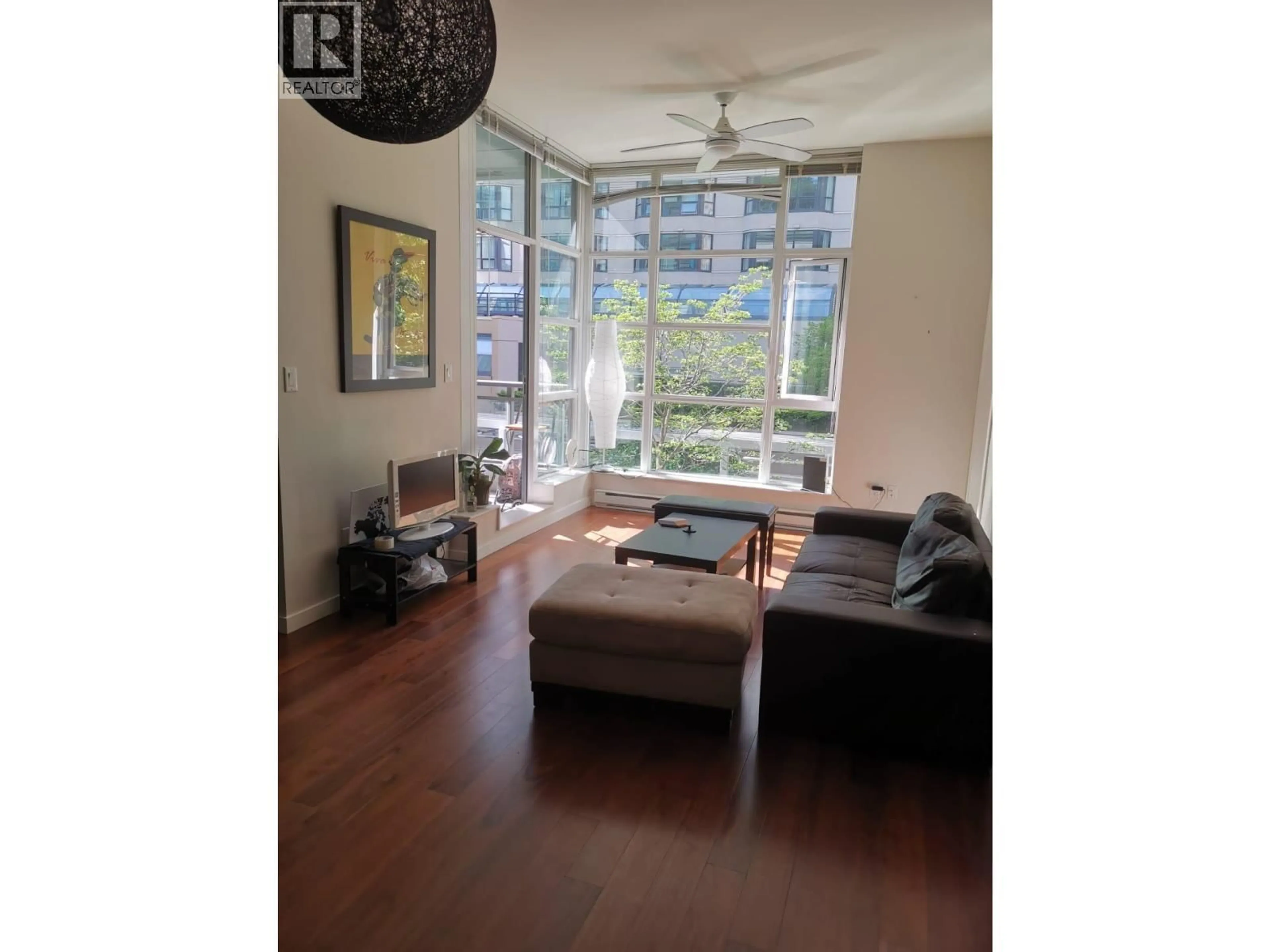 Living room with furniture, wood/laminate floor for 412 - 1205 HOWE STREET, Vancouver British Columbia V6Z0B2