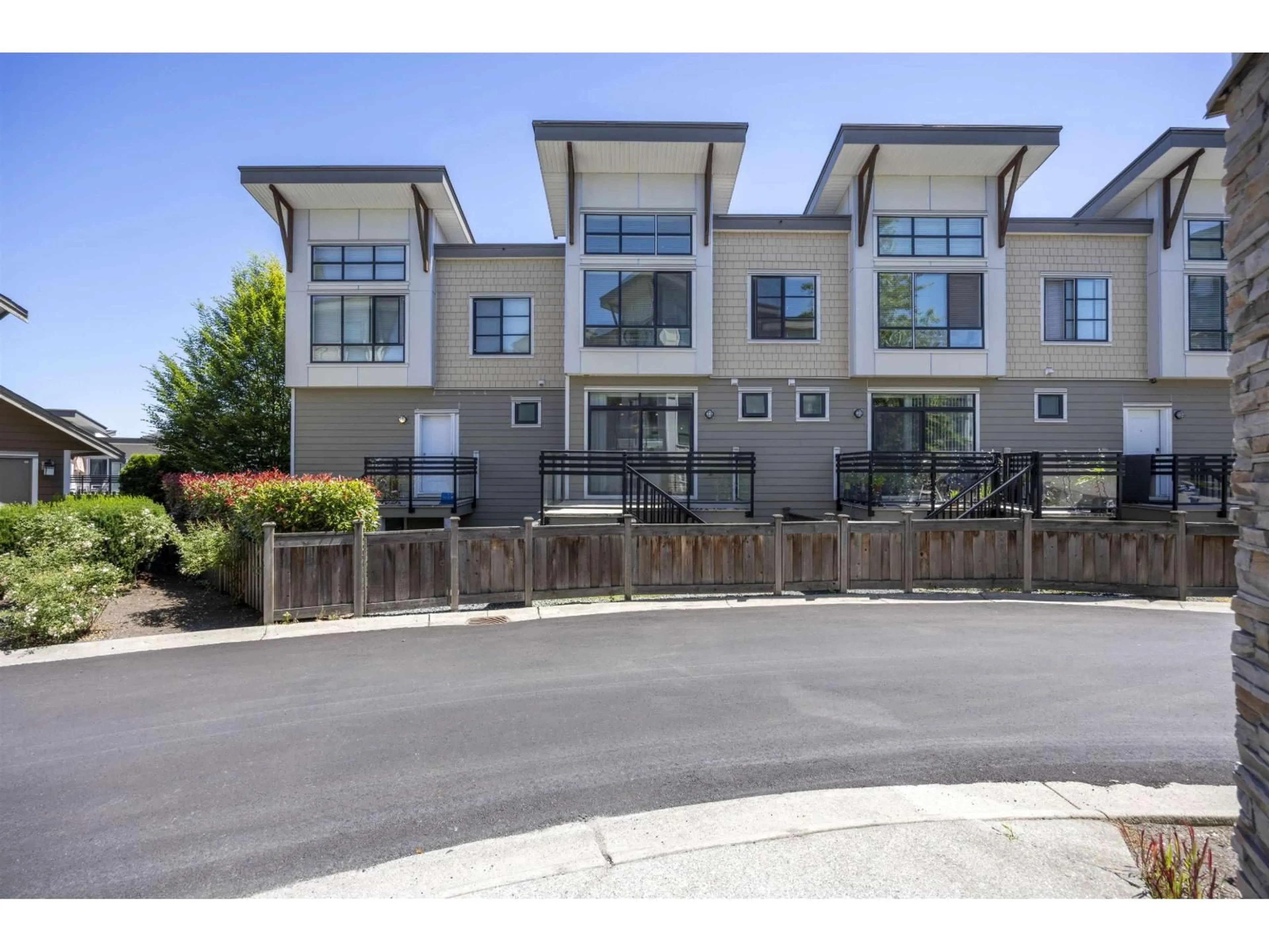 A pic from outside/outdoor area/front of a property/back of a property/a pic from drone, street for 11 - 9989 BARNSTON EAST, Surrey British Columbia V4N6N3