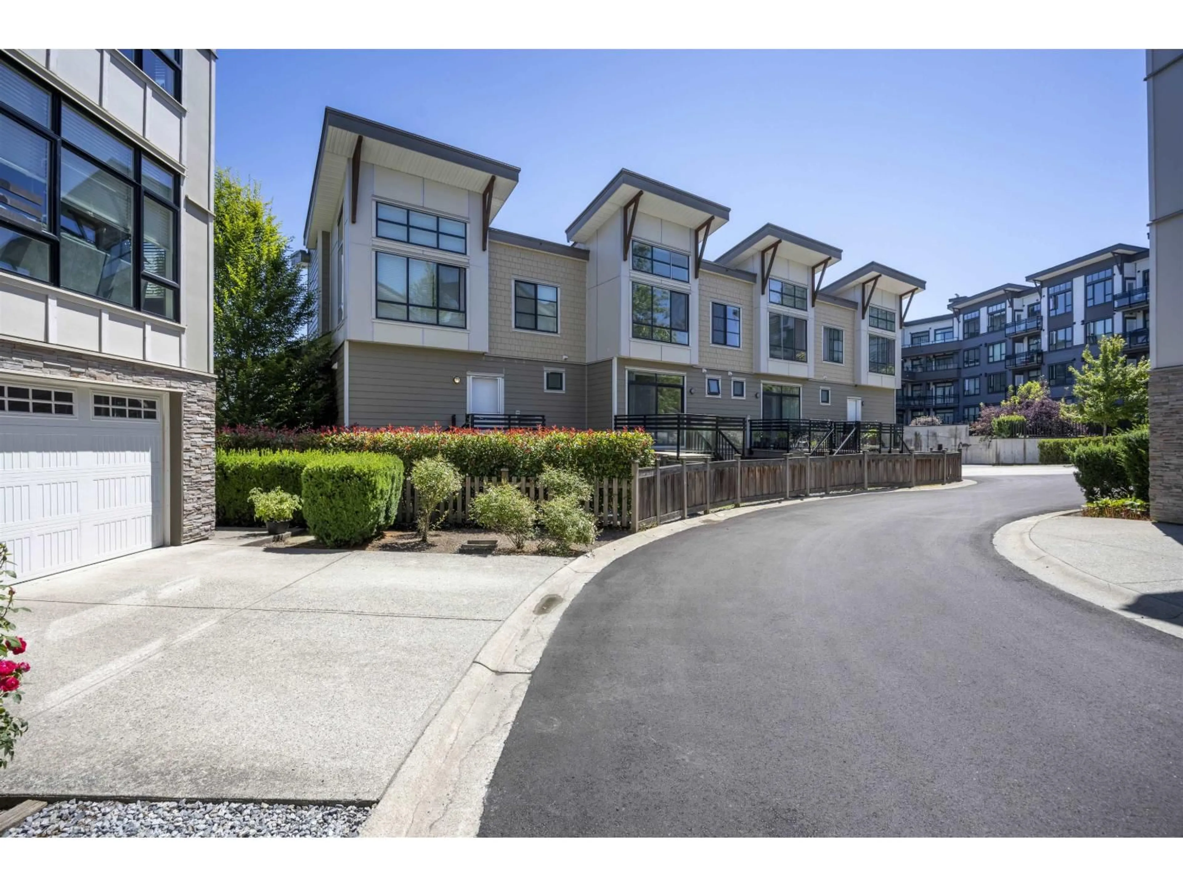 A pic from outside/outdoor area/front of a property/back of a property/a pic from drone, street for 11 - 9989 BARNSTON EAST, Surrey British Columbia V4N6N3