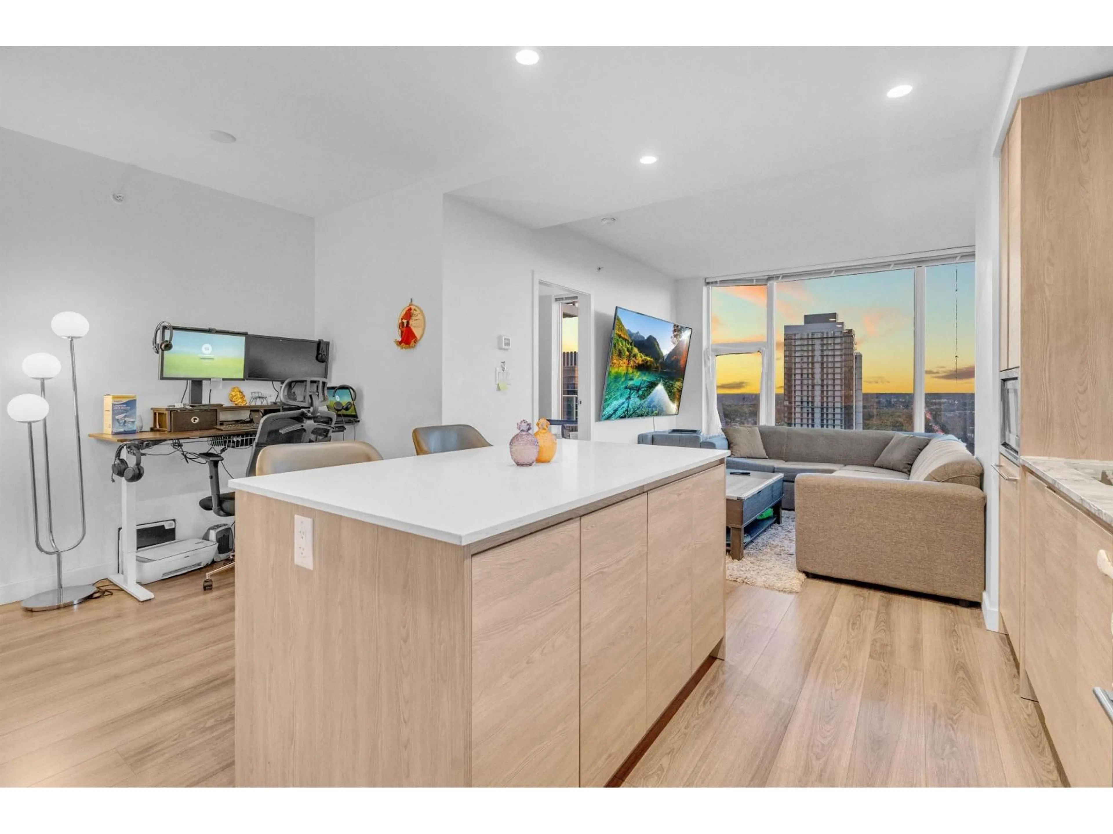 Open concept kitchen, wood/laminate floor for 2703 - 13615 FRASER, Surrey British Columbia V3T0P7