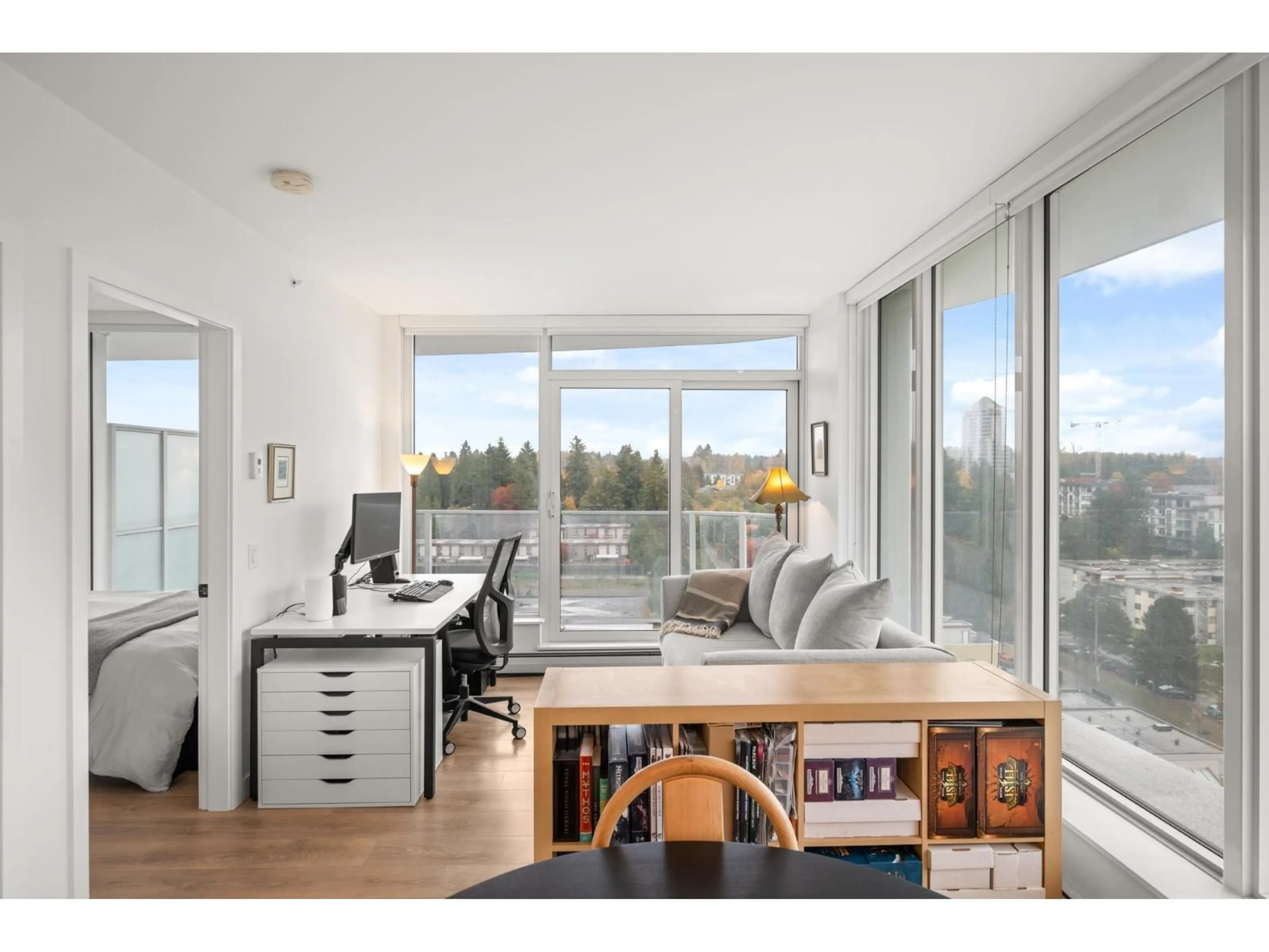 Living room with furniture, wood/laminate floor for 1105 - 13685 102, Surrey British Columbia V3T1N7