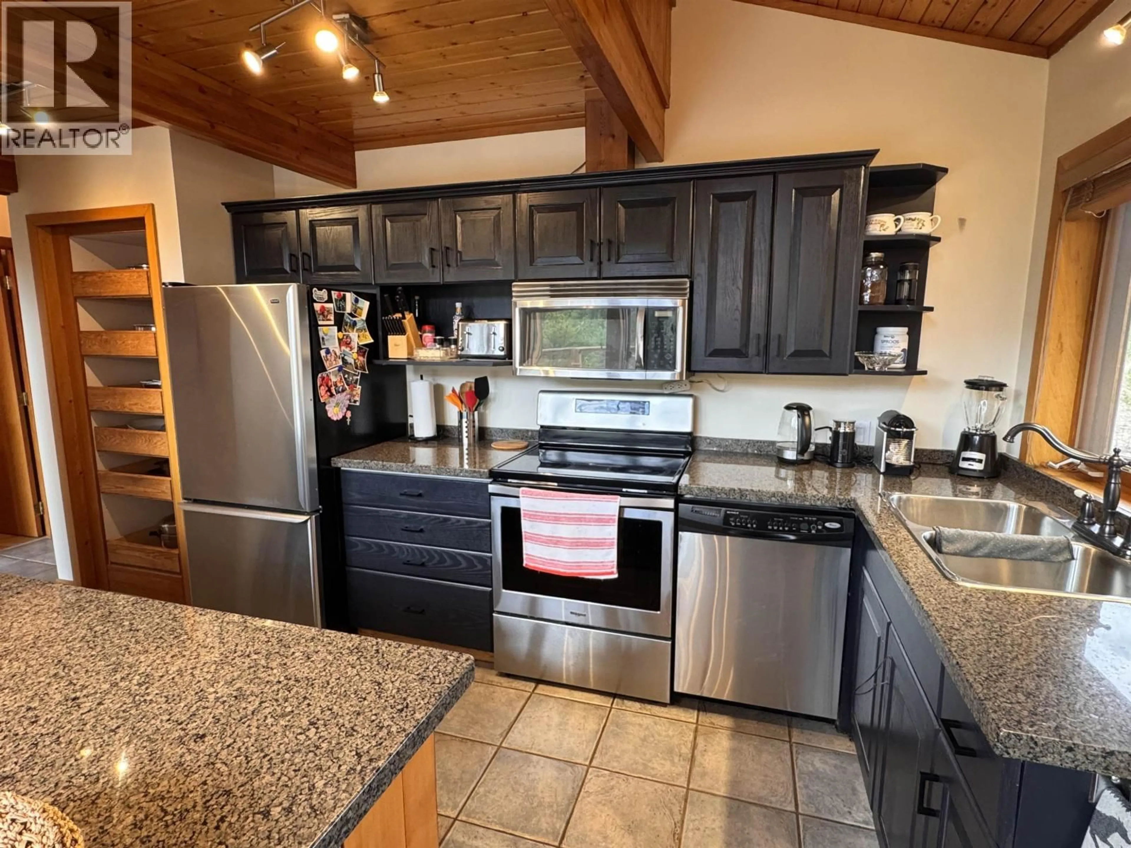 Open concept kitchen, unknown for 6796 TATLAYOKO ROAD, Chilcotin British Columbia V0L1W0