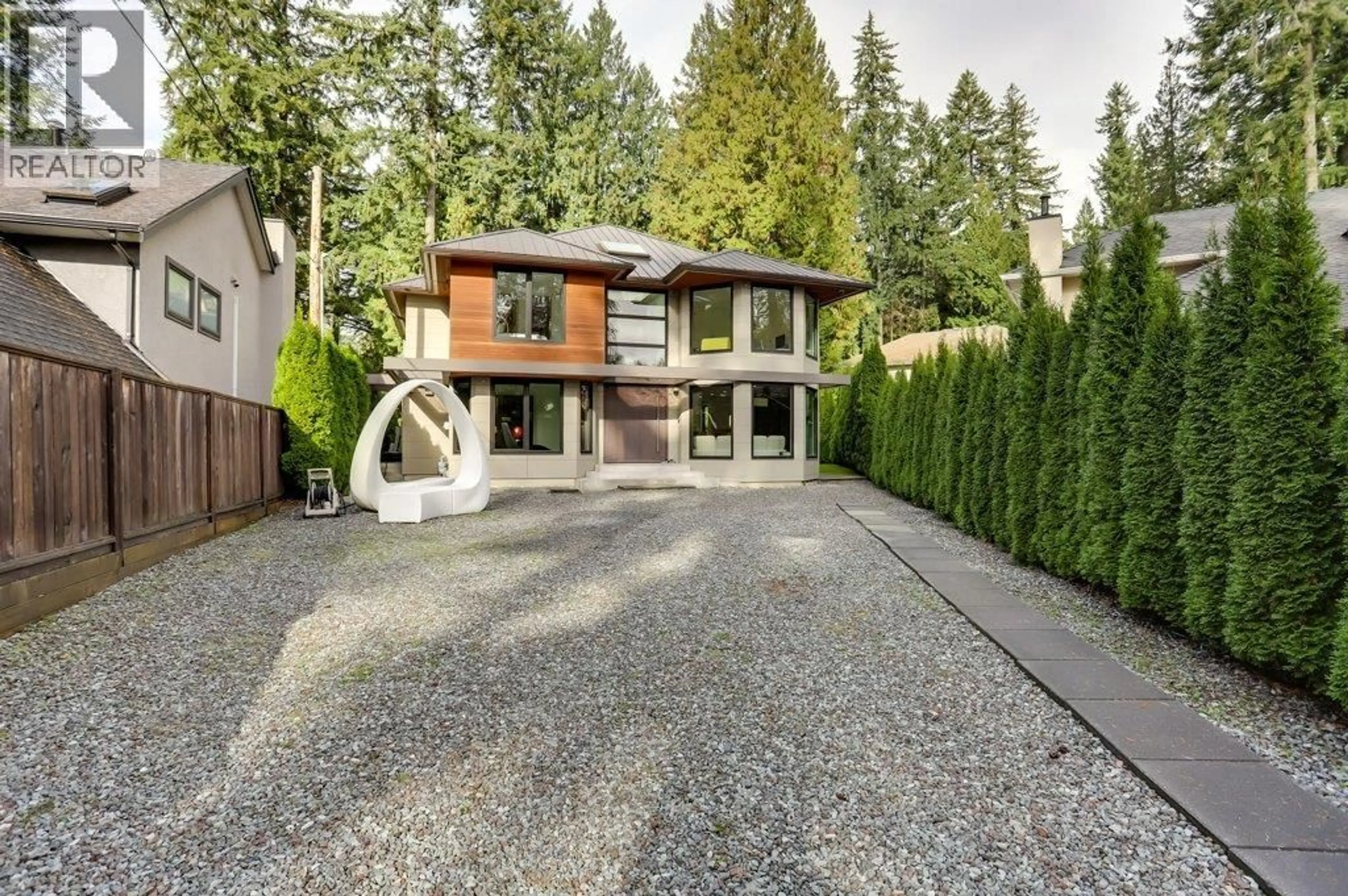 Home with brick exterior material, street for 4577 CAPILANO ROAD, North Vancouver British Columbia V7R4K3