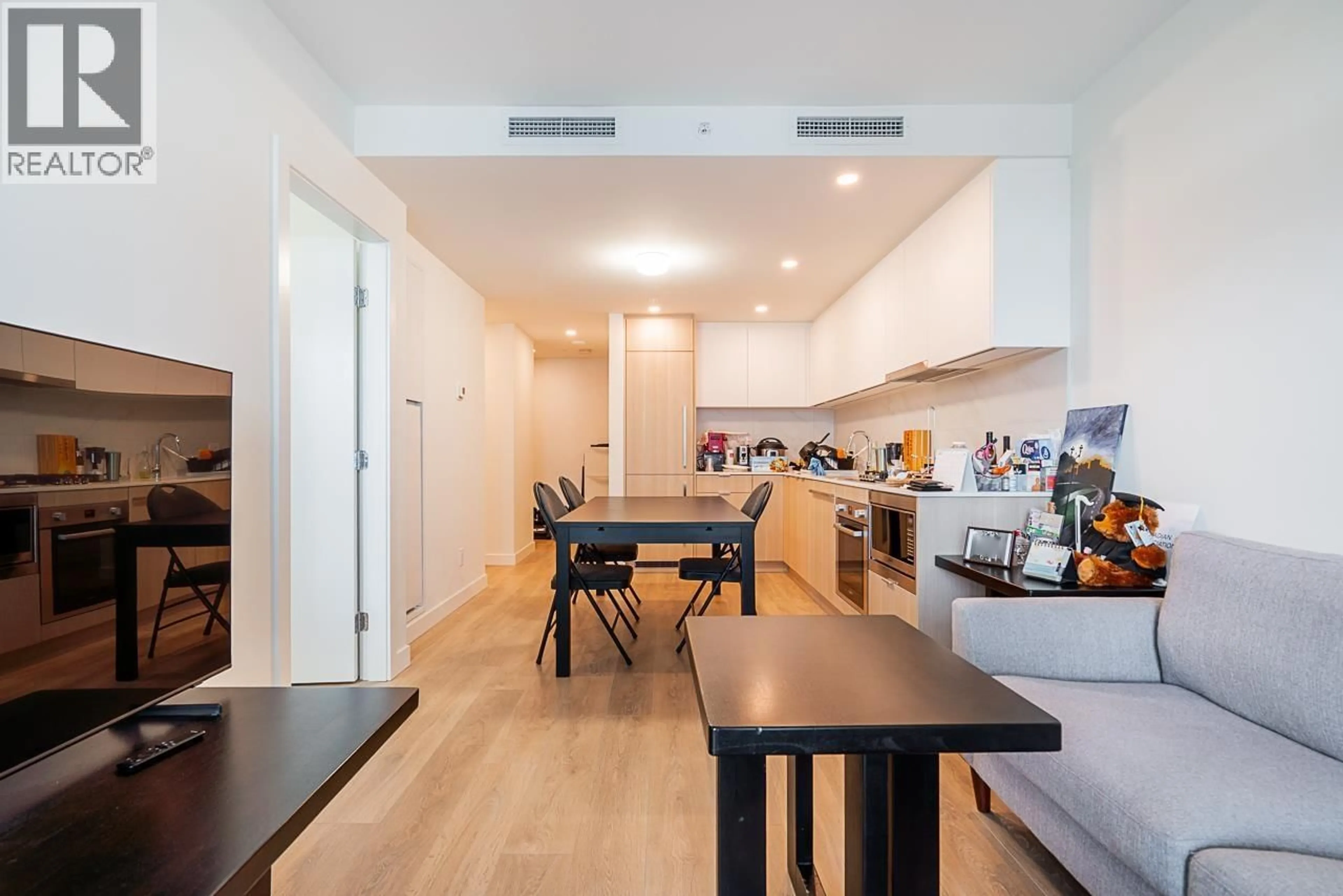 Open concept kitchen, wood/laminate floor for 1306 - 308 ALDERSON AVENUE, Coquitlam British Columbia V3K0J2