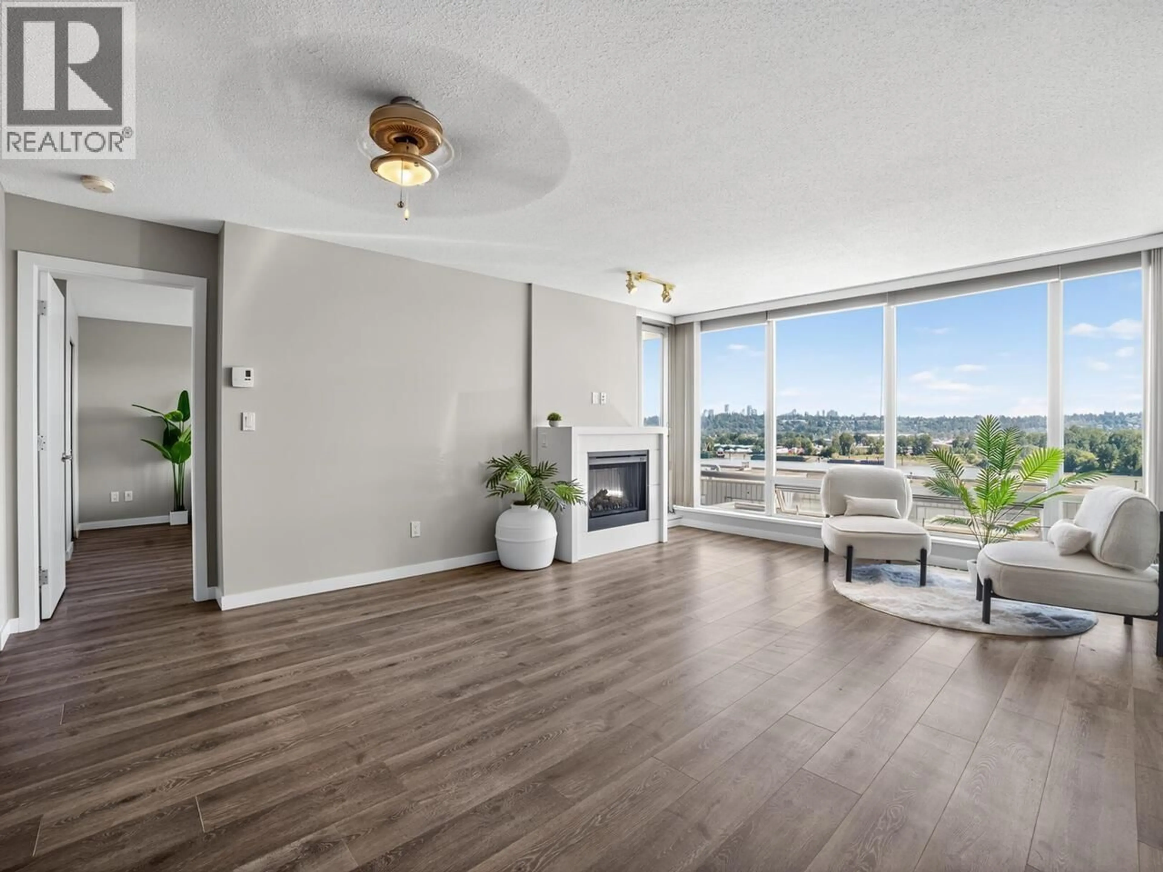 Living room with furniture, wood/laminate floor for 704 - 39 SIXTH STREET, New Westminster British Columbia V3L0B3