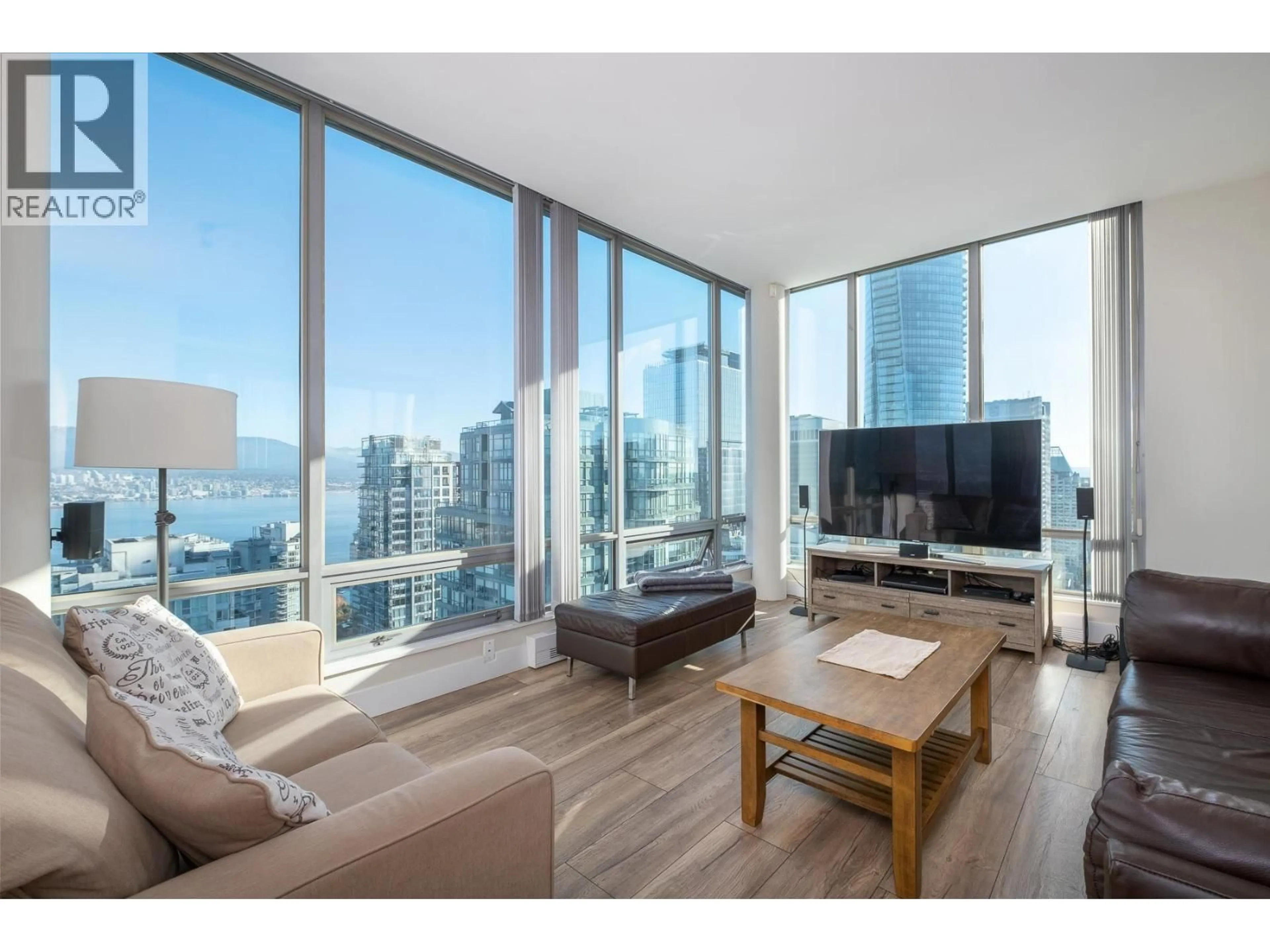 Living room with furniture, wood/laminate floor for PH2 - 1288 GEORGIA STREET, Vancouver British Columbia V6E4R3