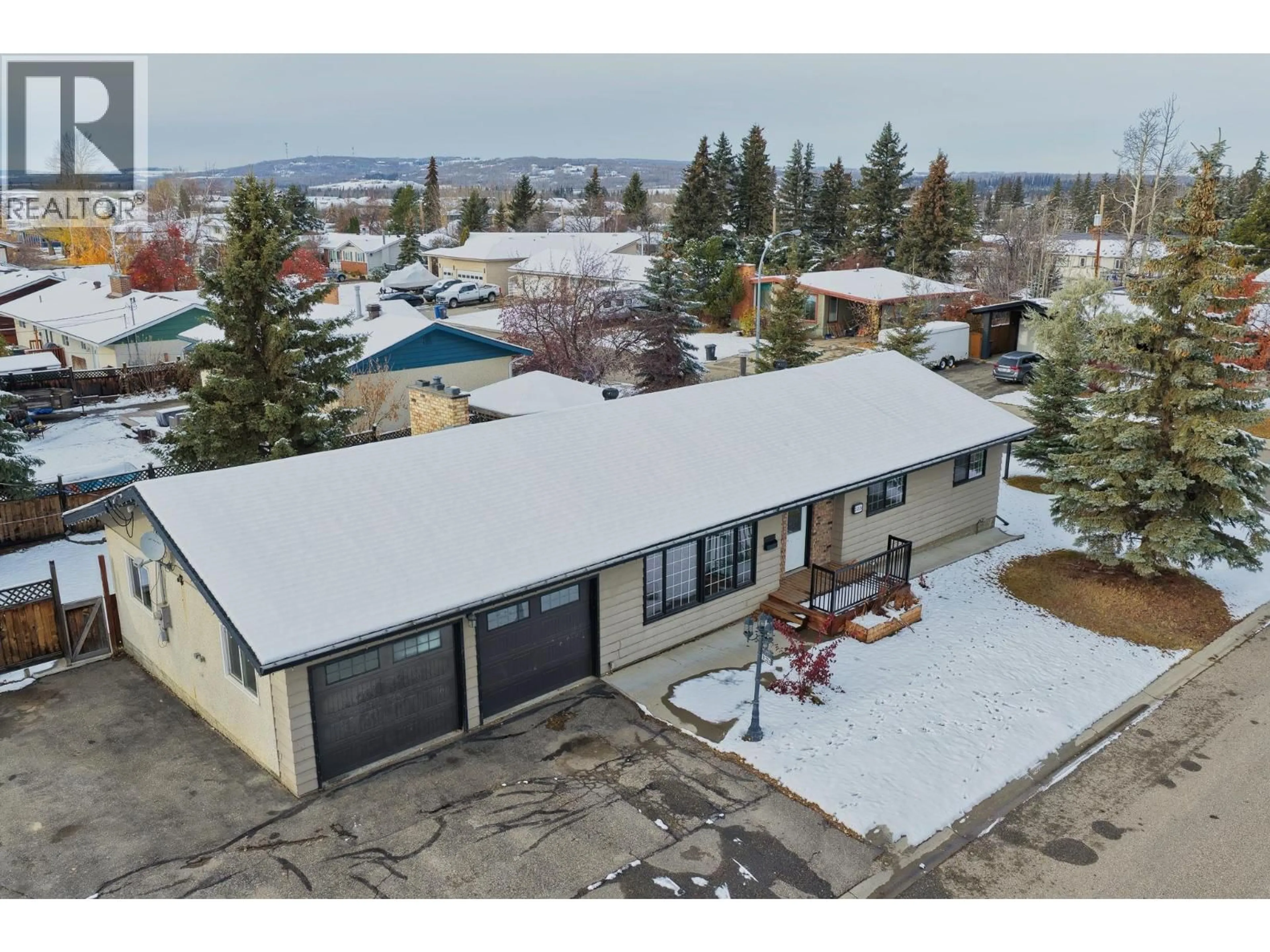 A pic from outside/outdoor area/front of a property/back of a property/a pic from drone, unknown for 11324 94 STREET, Fort St. John British Columbia V1J3M2