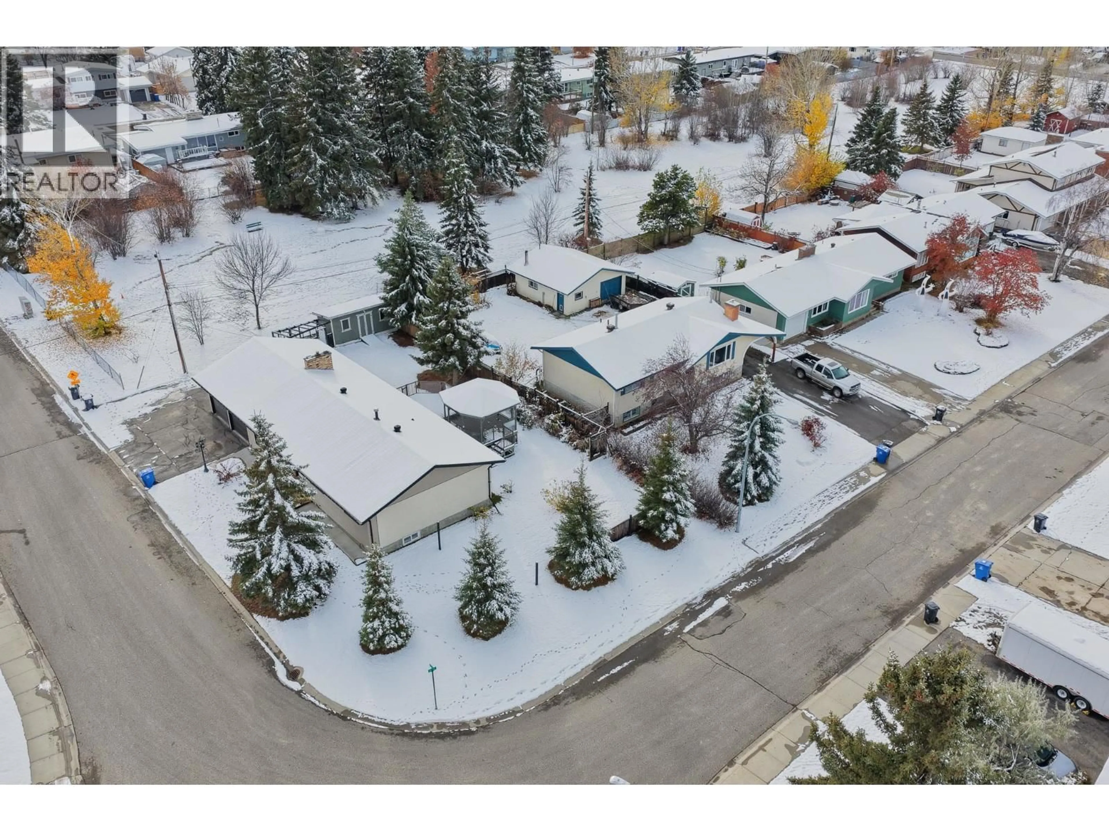 A pic from outside/outdoor area/front of a property/back of a property/a pic from drone, street for 11324 94 STREET, Fort St. John British Columbia V1J3M2