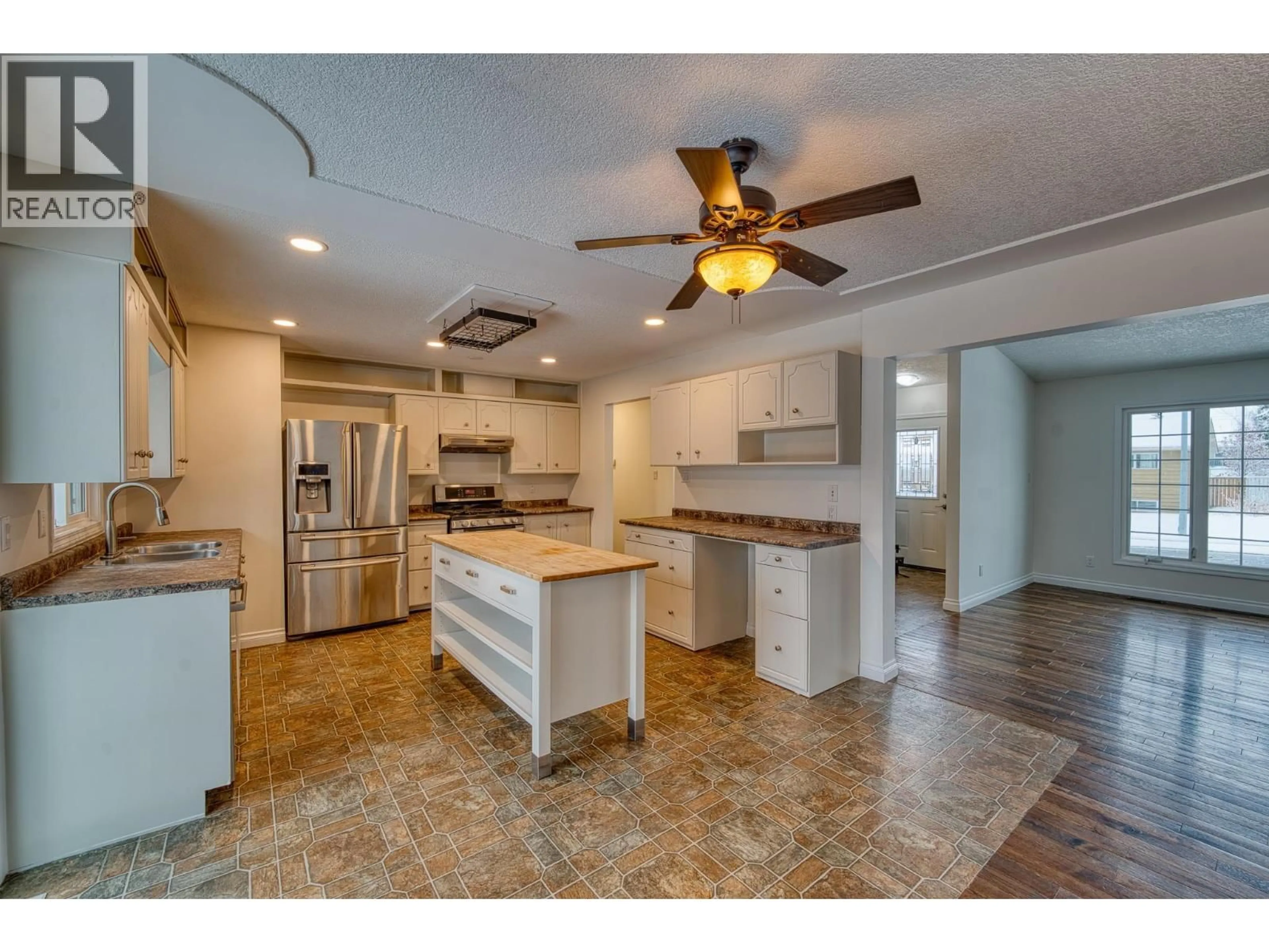 Open concept kitchen, ceramic/tile floor for 11324 94 STREET, Fort St. John British Columbia V1J3M2