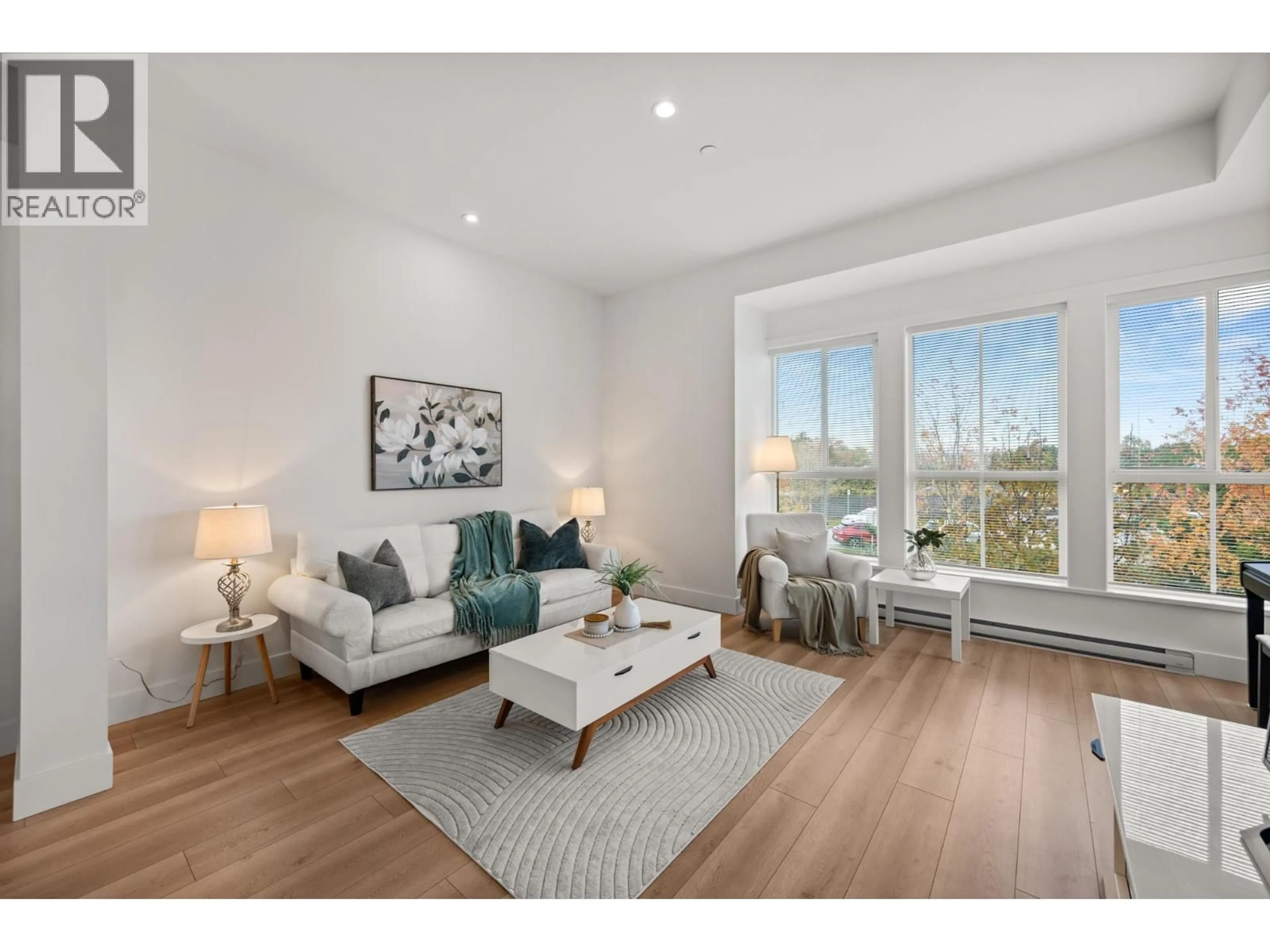 Living room with furniture, wood/laminate floor for 72 - 4656 ORCA WAY, Tsawwassen British Columbia V4M0C9