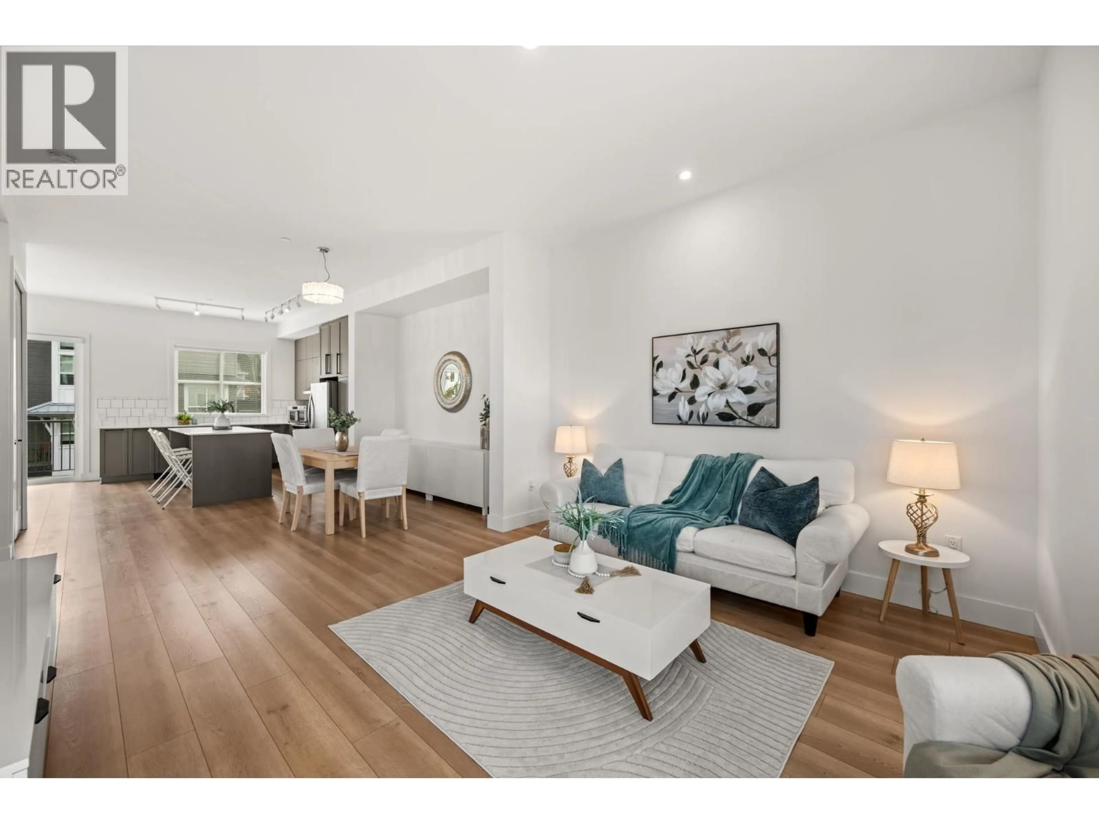 Living room with furniture, wood/laminate floor for 72 - 4656 ORCA WAY, Tsawwassen British Columbia V4M0C9