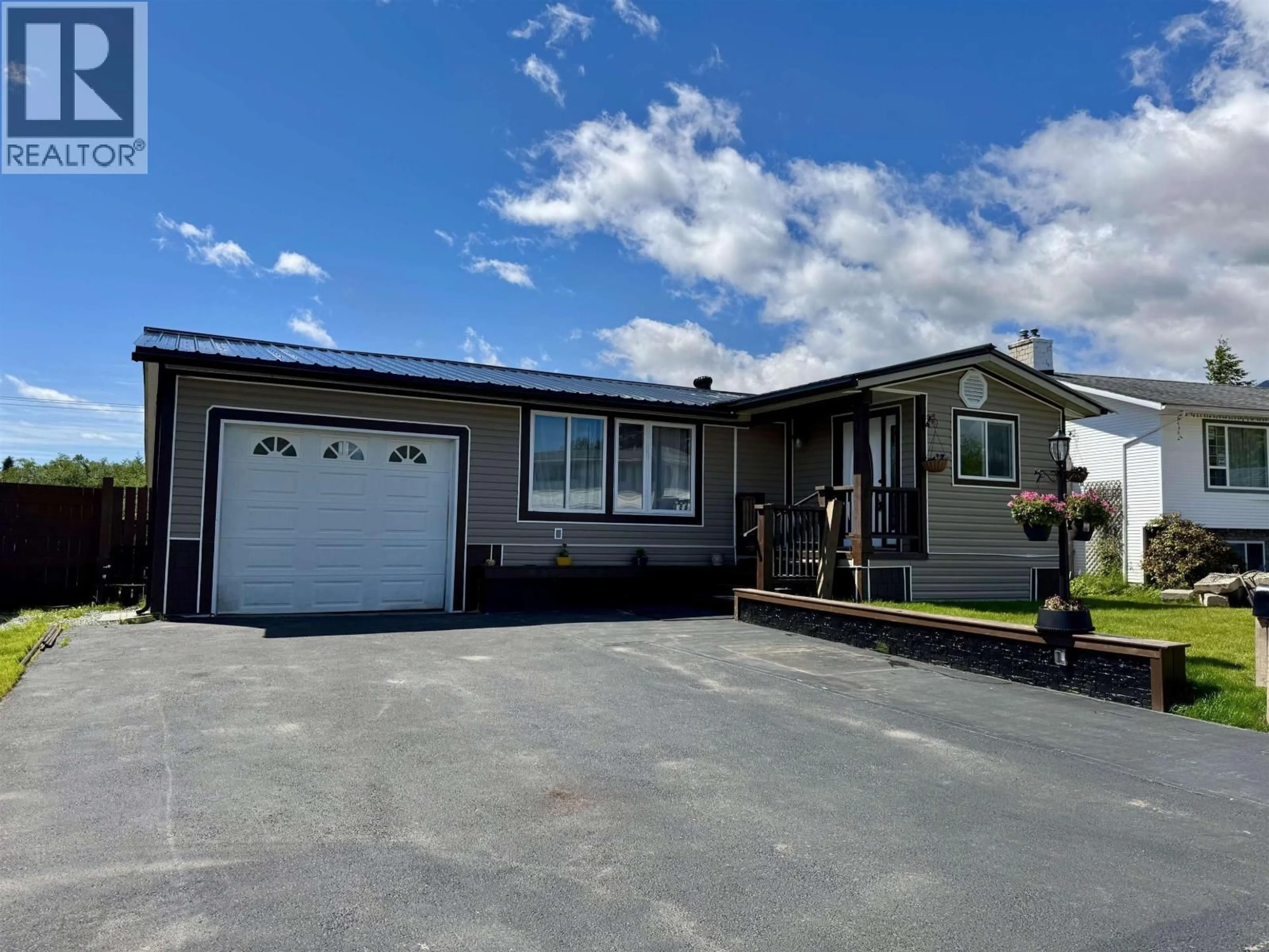 Home with vinyl exterior material, street for 107 CARLSON STREET, Kitimat British Columbia V8C1A9