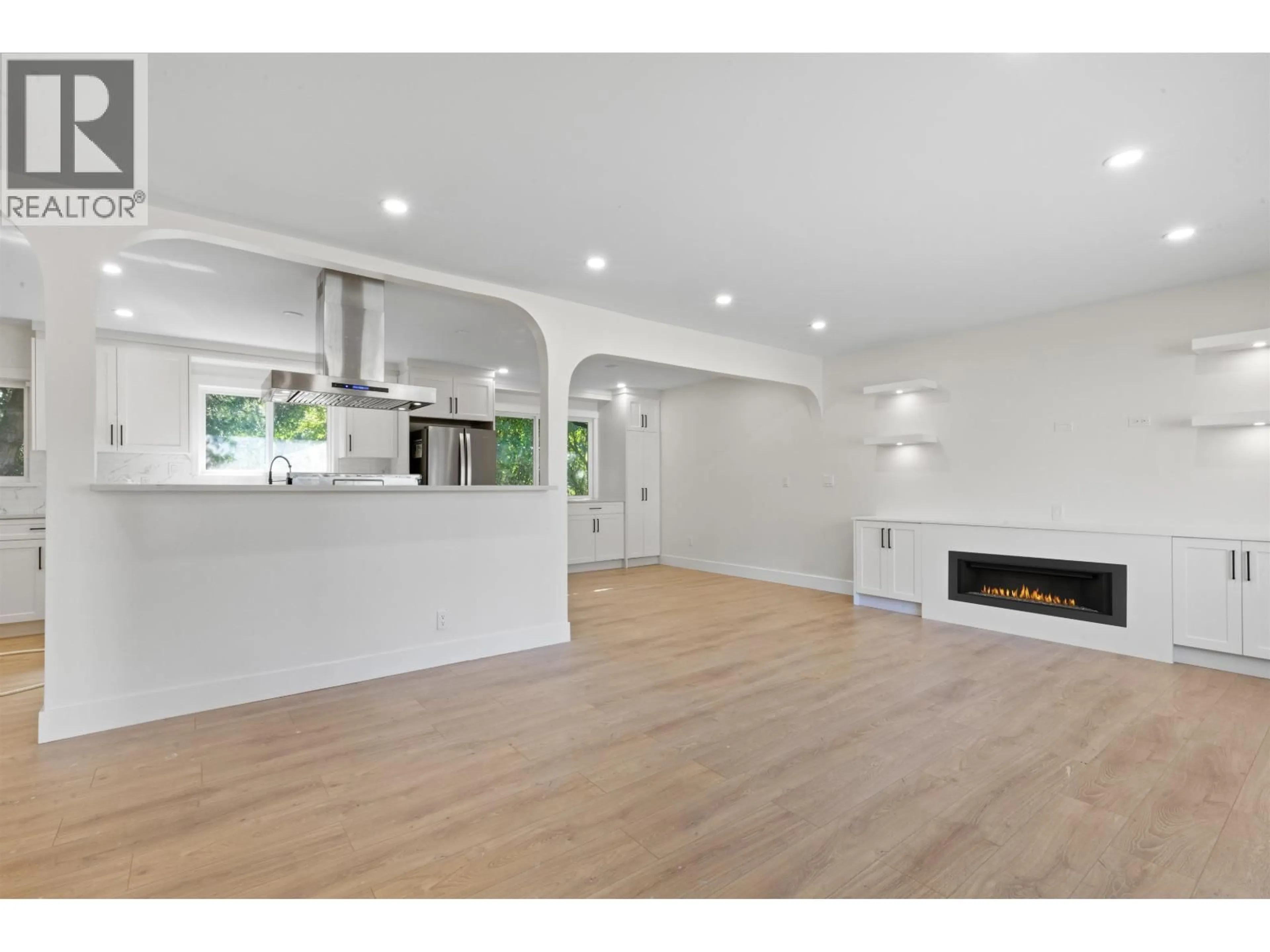 Open concept kitchen, wood/laminate floor for 20306 116 AVENUE, Maple Ridge British Columbia V2X1Y3