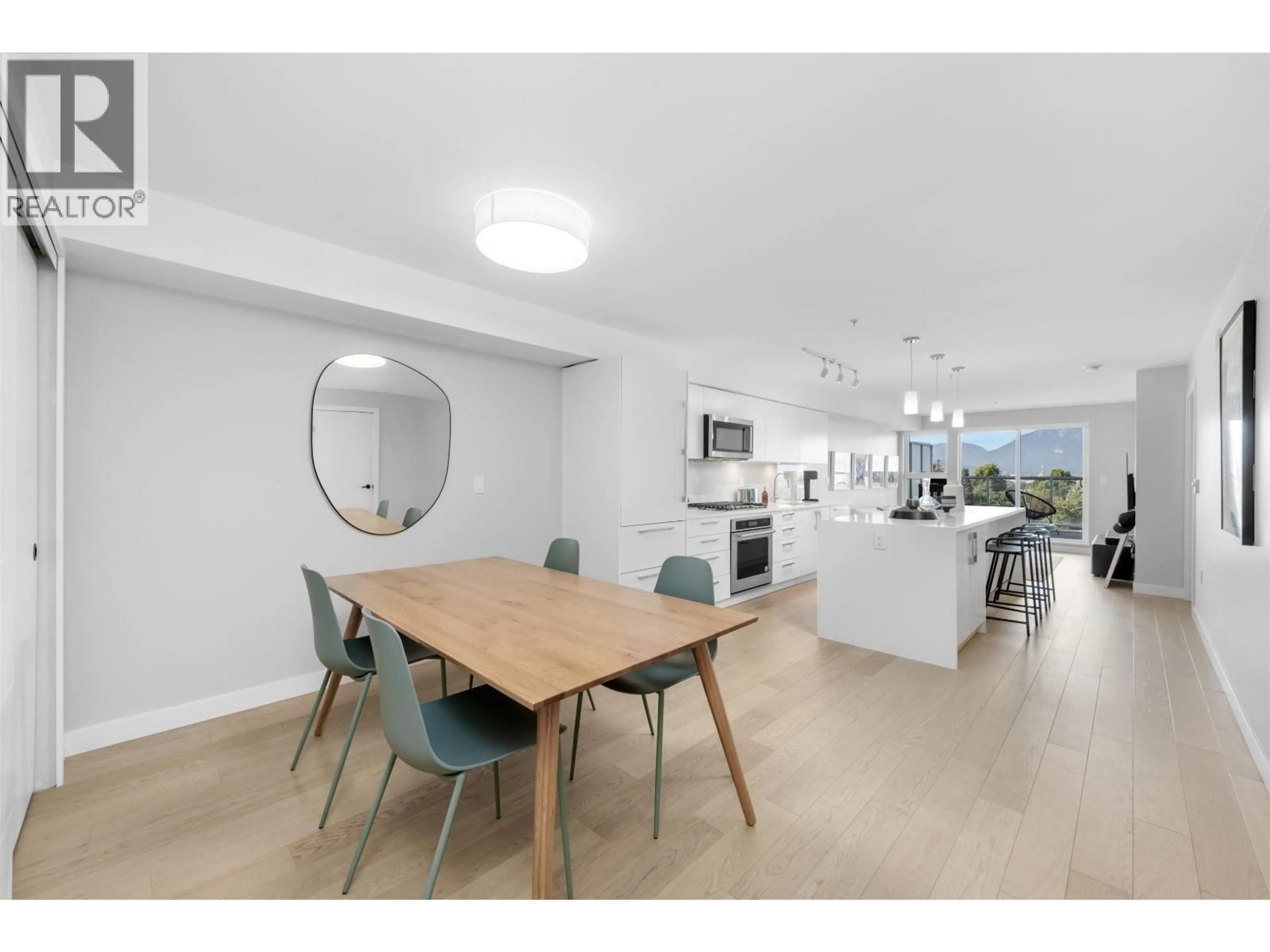 Open concept kitchen, unknown for 406 - 2508 FRASER STREET, Vancouver British Columbia V5T3V4