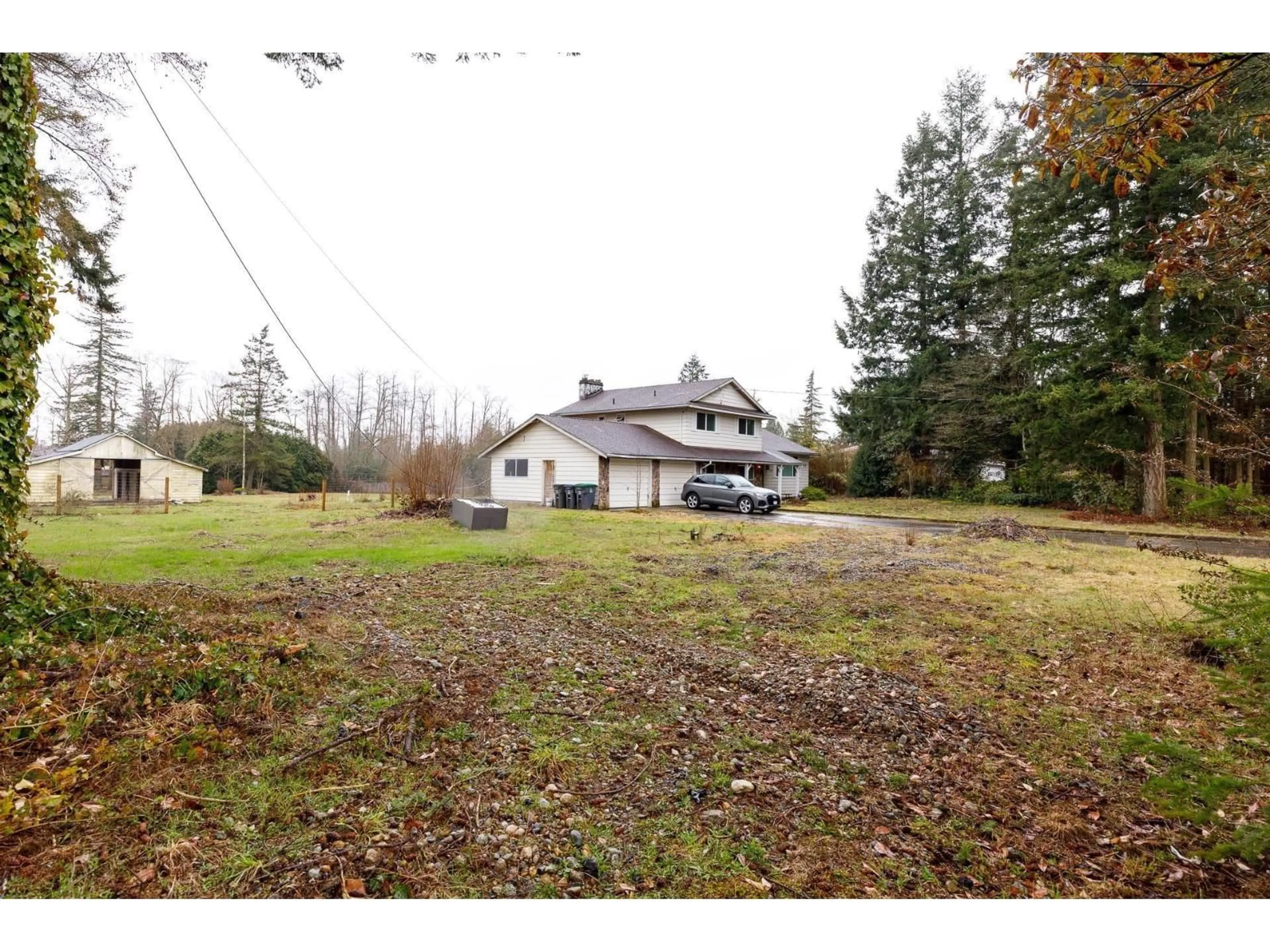 A pic from outside/outdoor area/front of a property/back of a property/a pic from drone, unknown for 16950 23, Surrey British Columbia V3Z9Z2