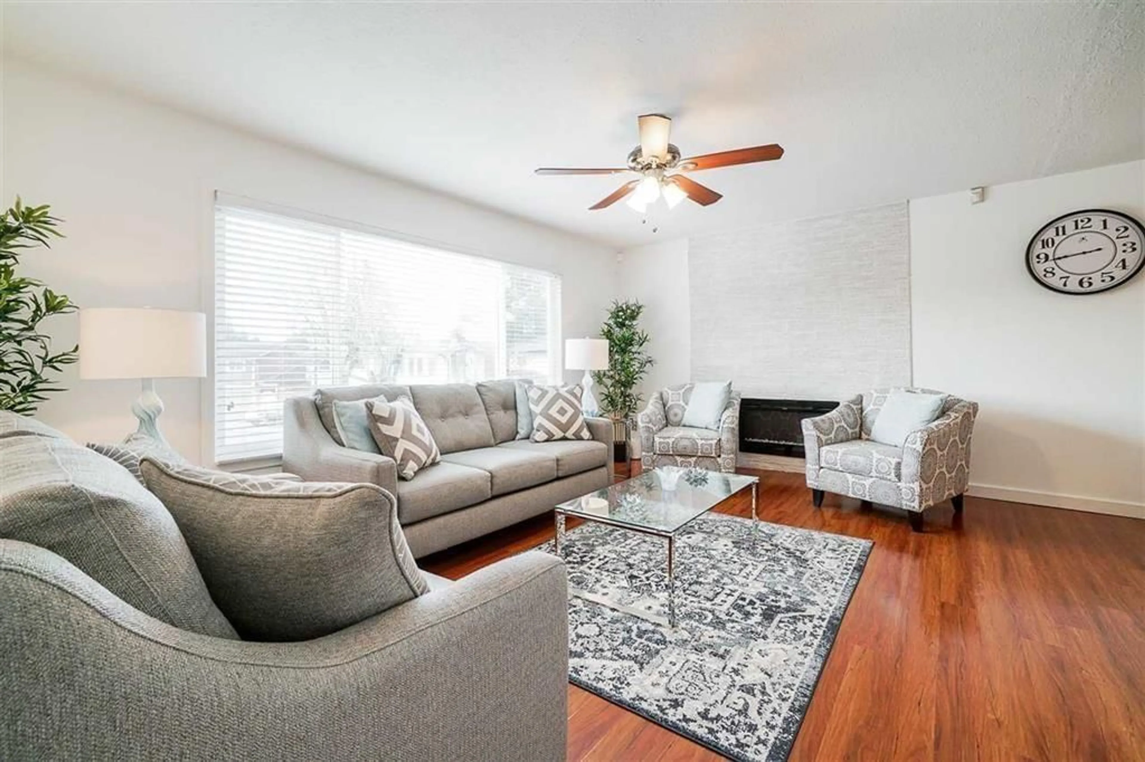 Living room with furniture, wood/laminate floor for 3174 ROYAL, Abbotsford British Columbia V2T4J6