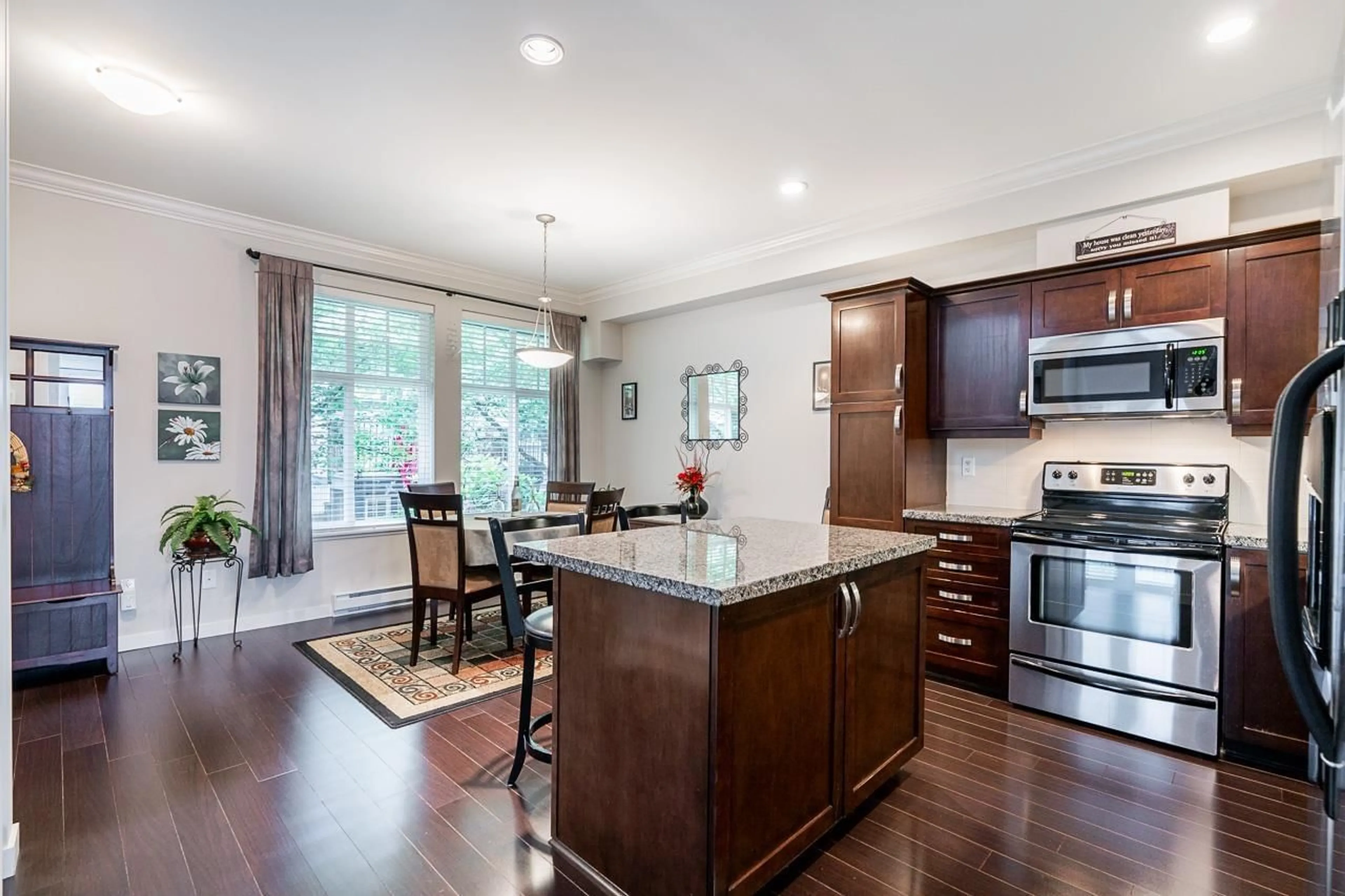 Open concept kitchen, wood/laminate floor for 17 - 14462 61A, Surrey British Columbia V3S2W3