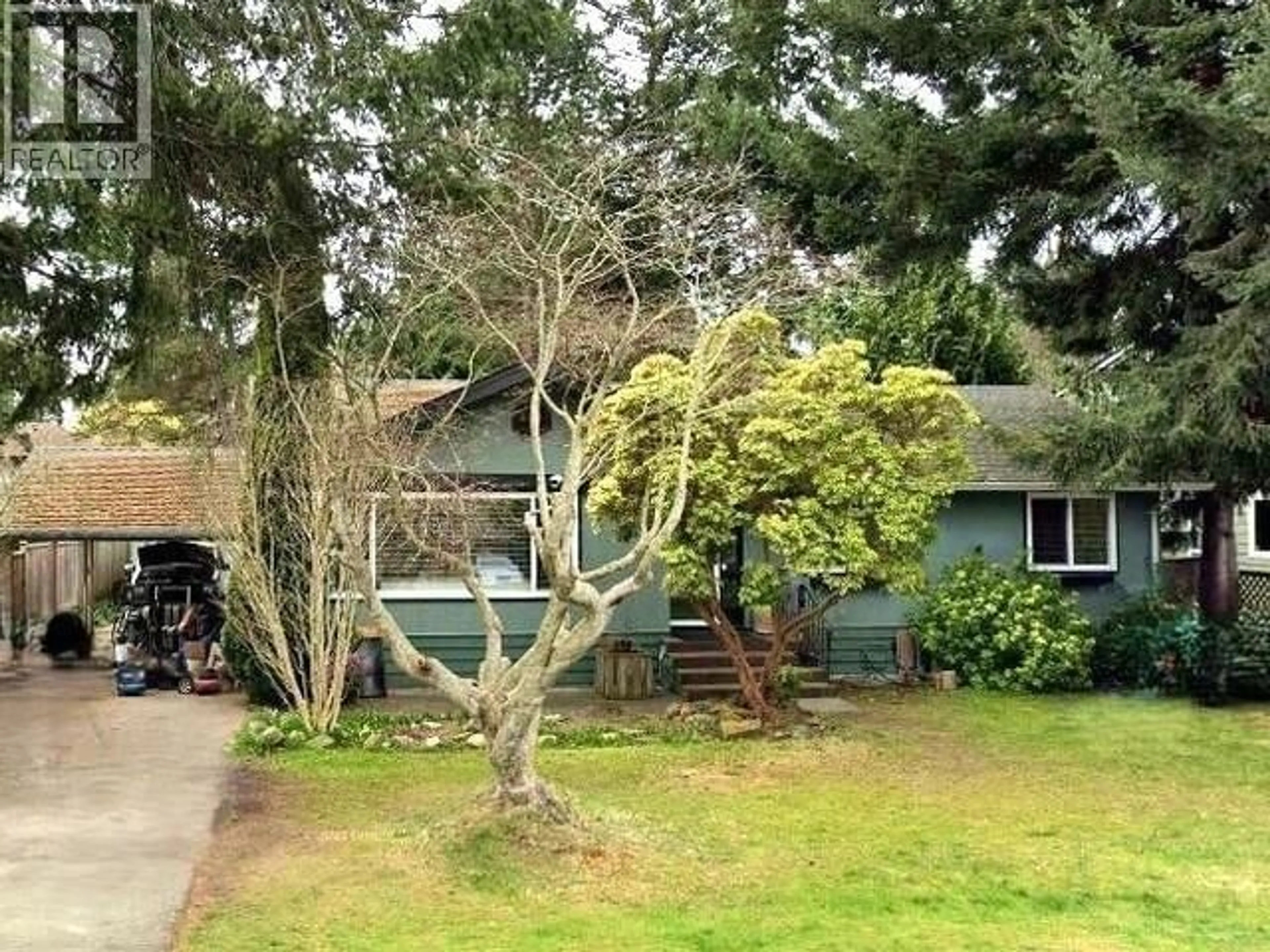 A pic from outside/outdoor area/front of a property/back of a property/a pic from drone, street for 5280 1 AVENUE, Delta British Columbia V4M1B7