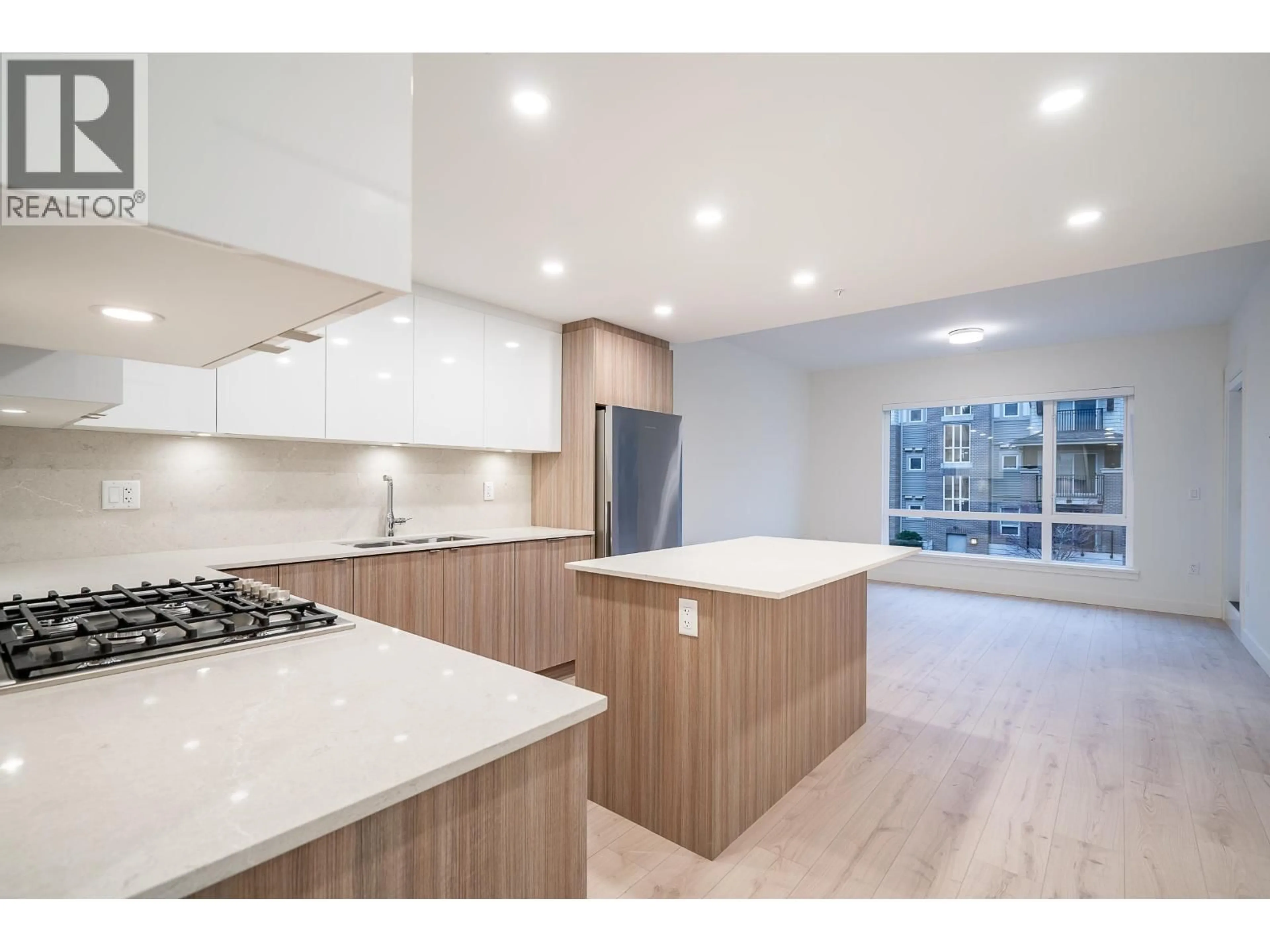Open concept kitchen, wood/laminate floor for 205 - 8428 PARK ROAD, Richmond British Columbia V6Y0K1