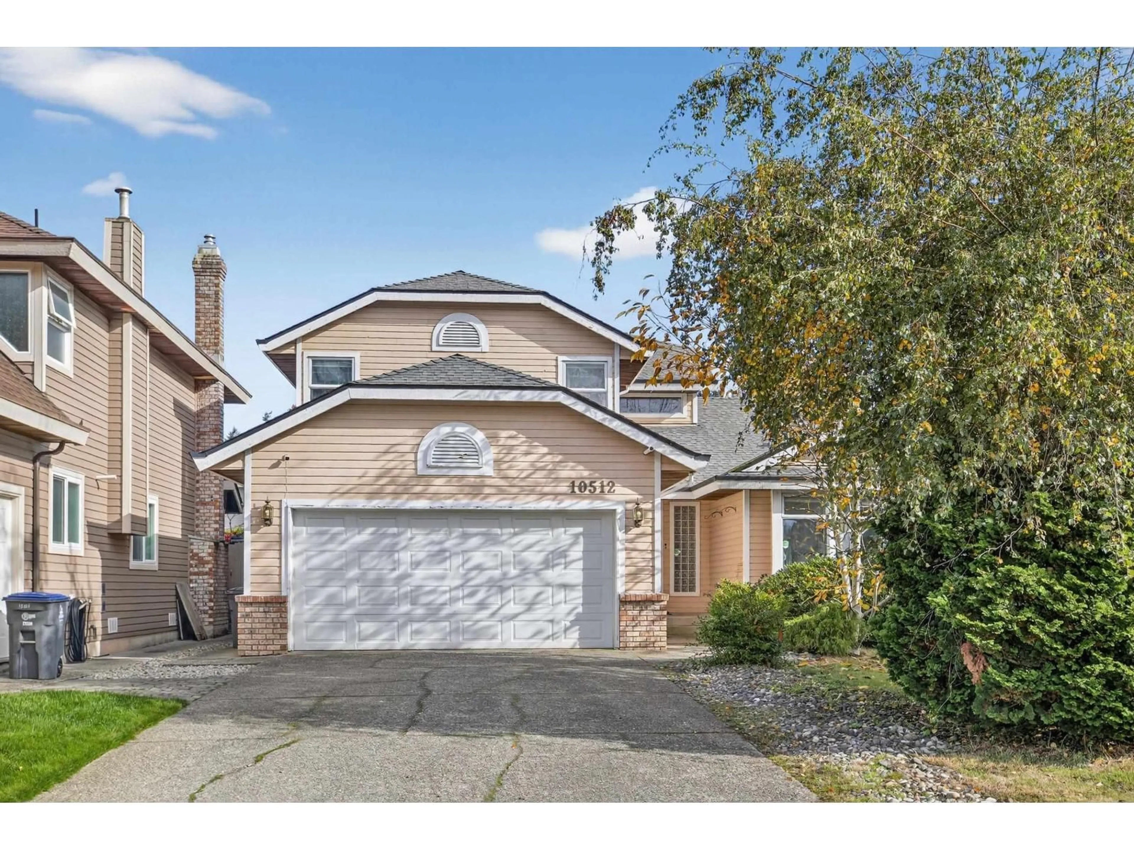 Home with brick exterior material, street for 10512 WOODGLEN, Surrey British Columbia V4N1V3