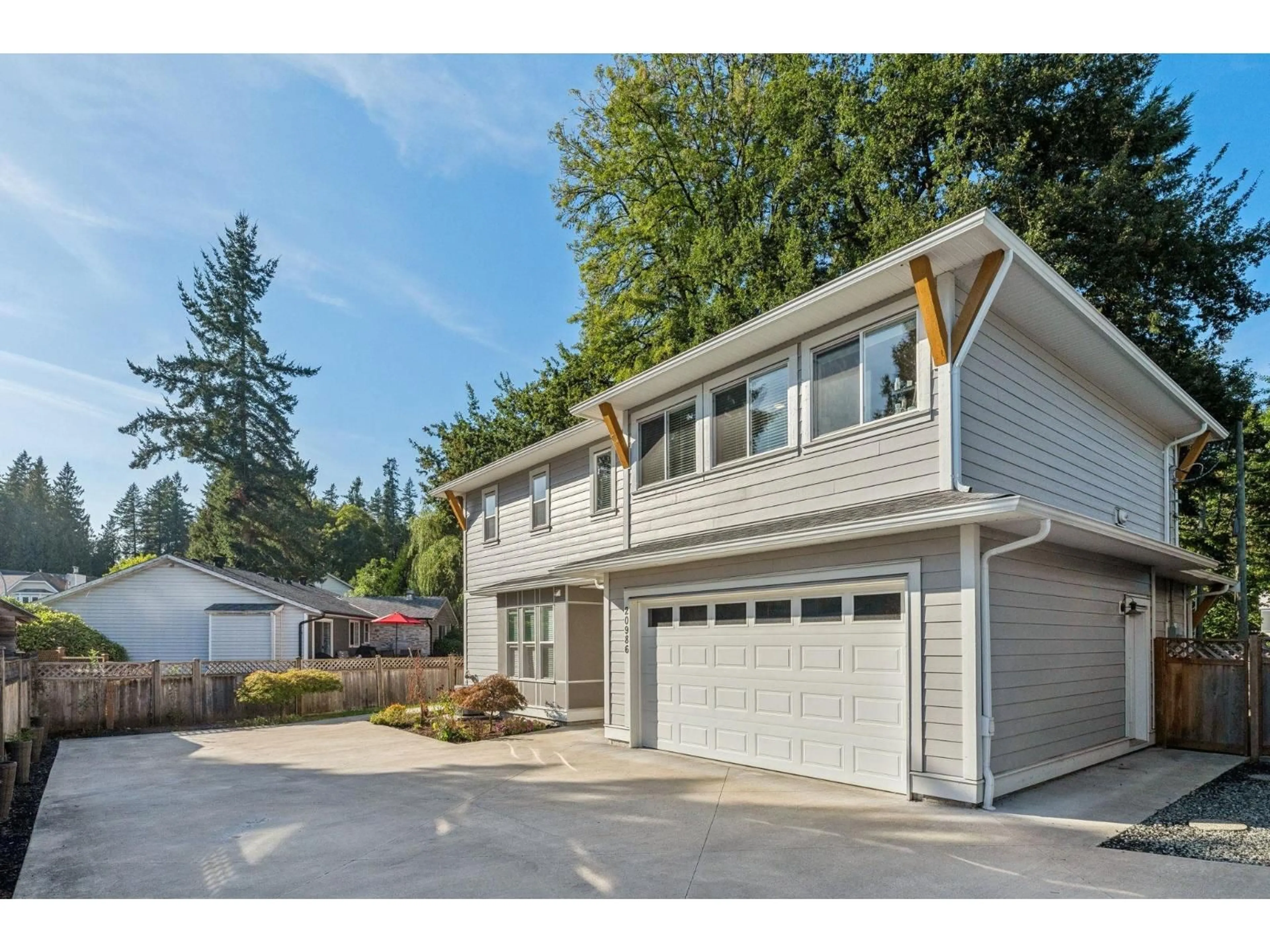Home with vinyl exterior material, street for 20986 96, Langley British Columbia V1M2Z3