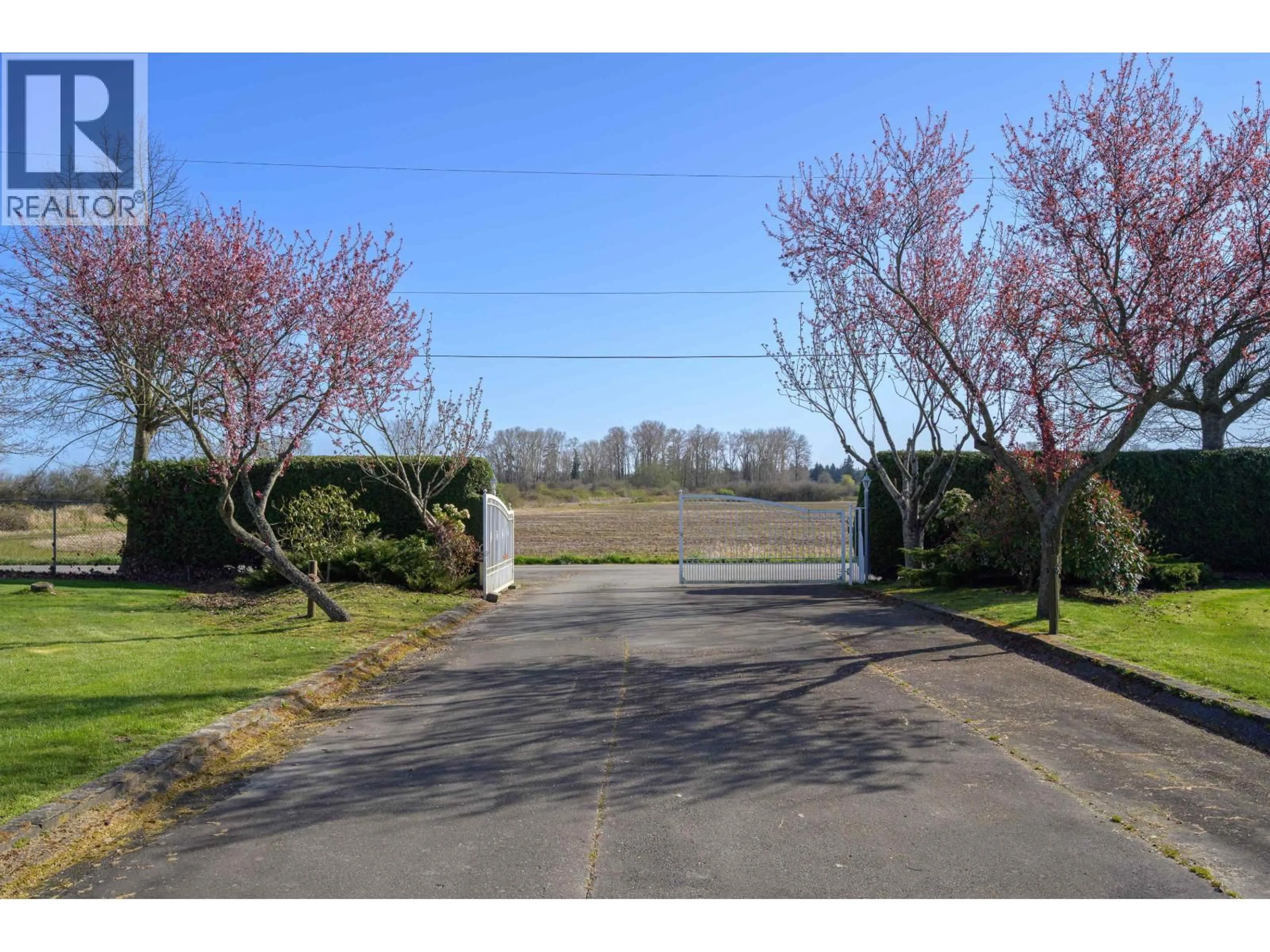 A pic from outside/outdoor area/front of a property/back of a property/a pic from drone, street for 2150 56 STREET, Delta British Columbia V4L2B1