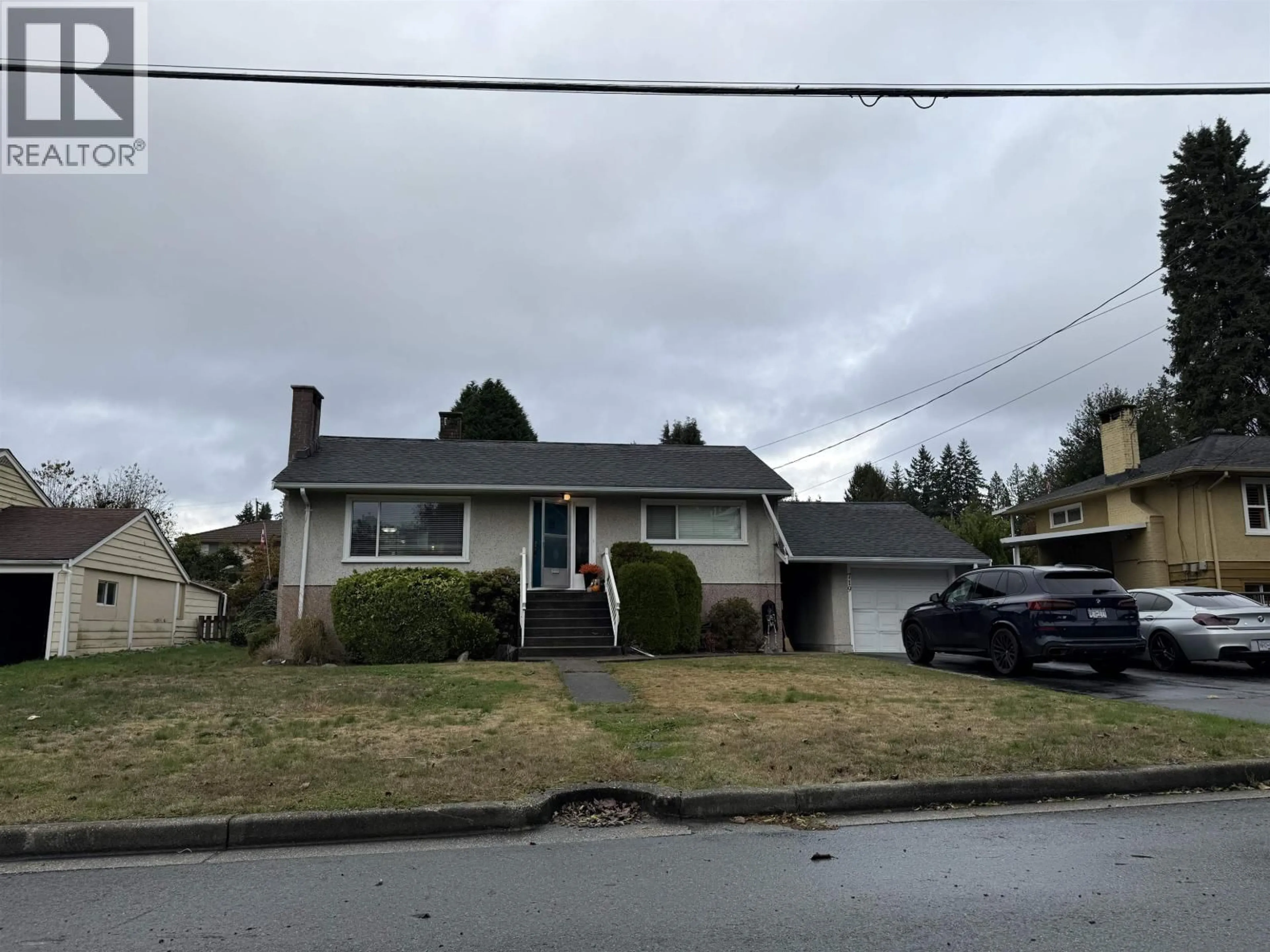 Home with vinyl exterior material, street for 719 IVY AVENUE, Coquitlam British Columbia V3J2J1