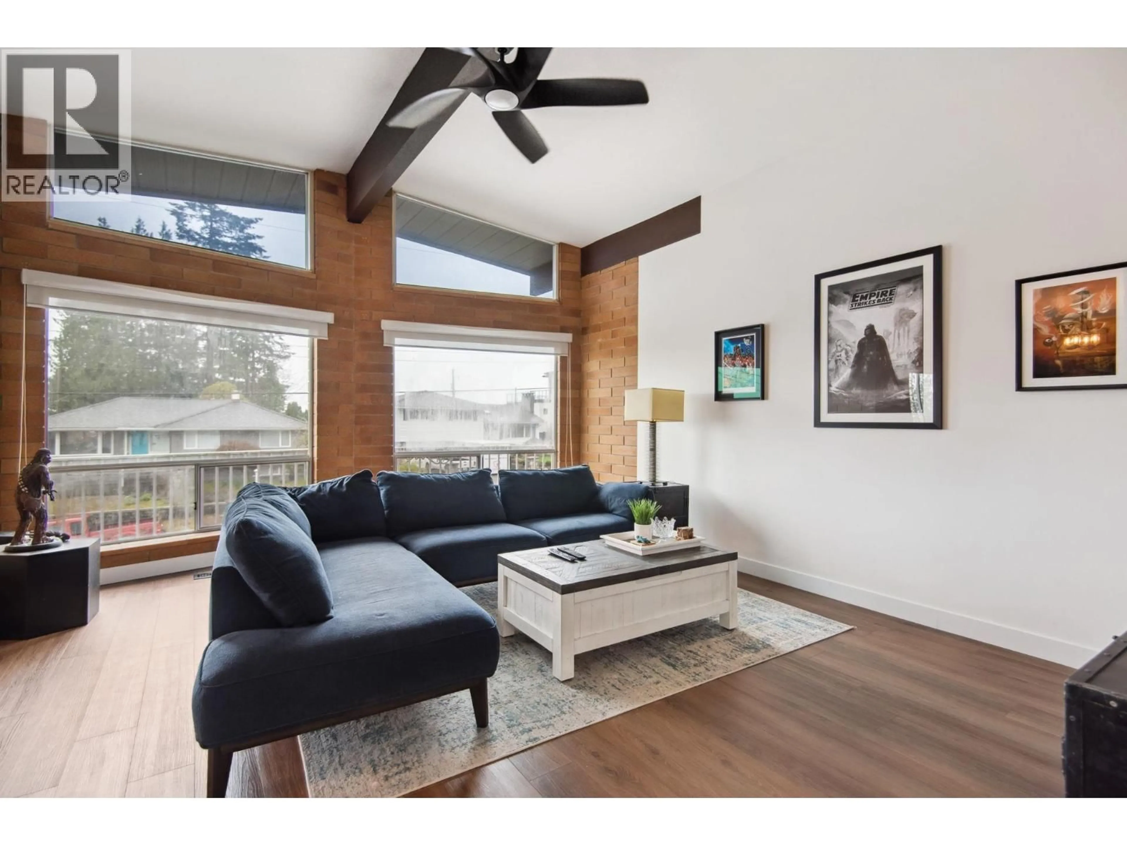 Living room with furniture, wood/laminate floor for 220 GROSVENOR AVENUE, Burnaby British Columbia V5B1J4