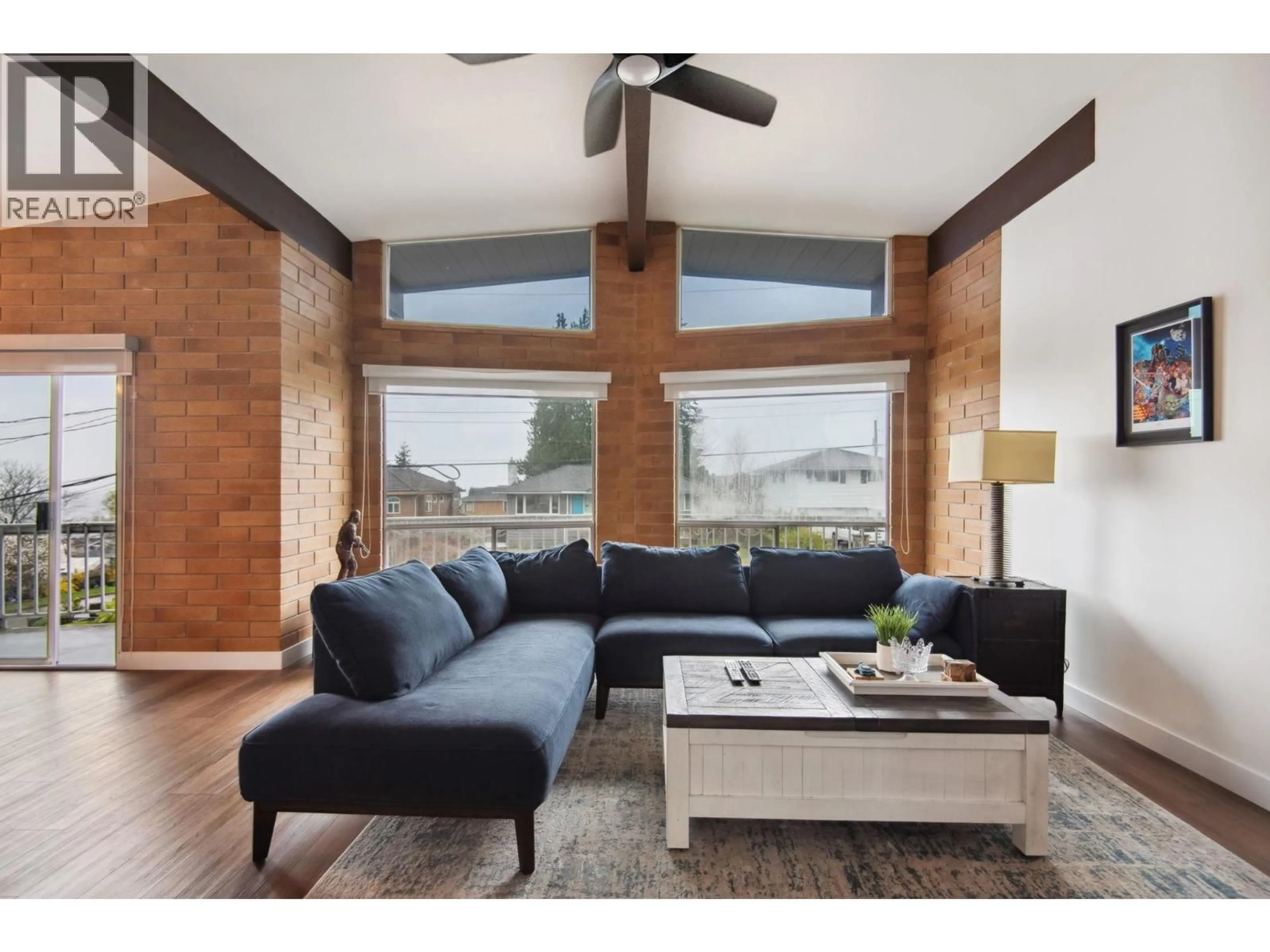 Living room with furniture, wood/laminate floor for 220 GROSVENOR AVENUE, Burnaby British Columbia V5B1J4