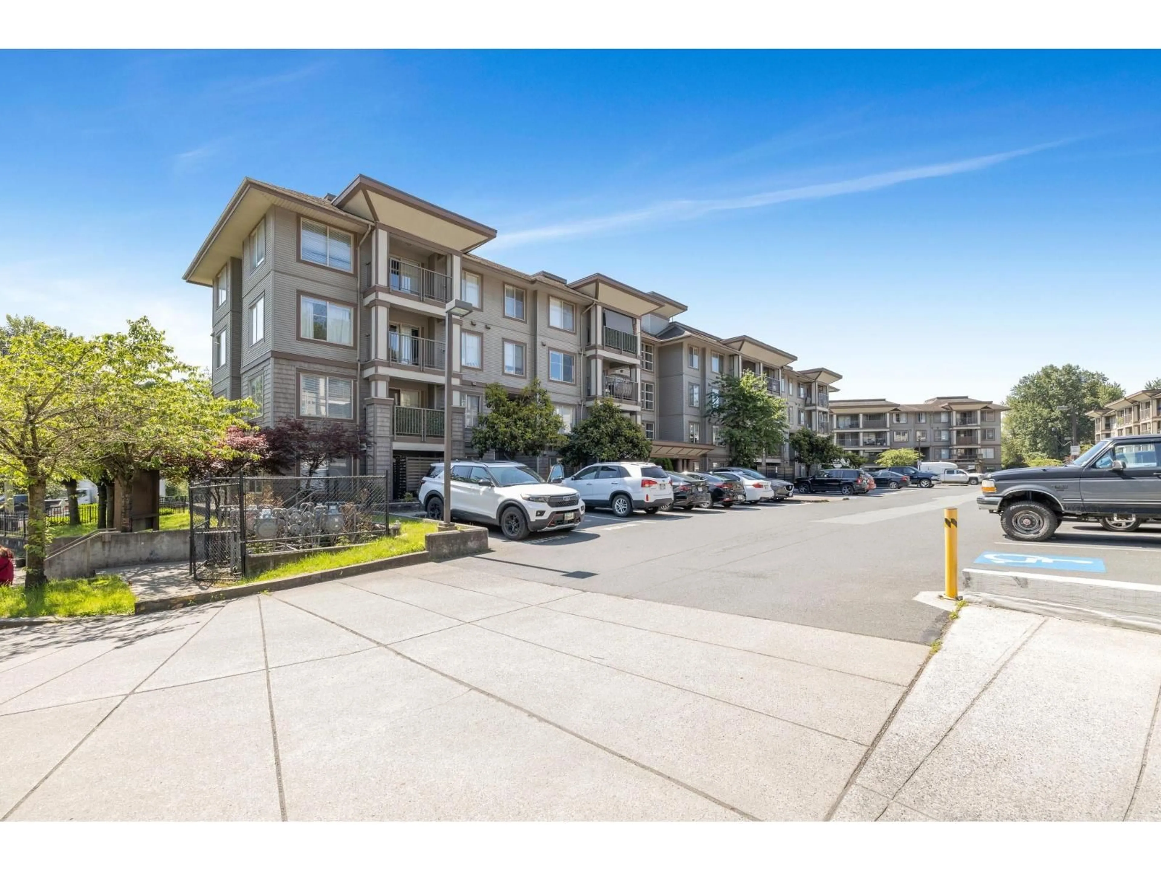 A pic from outside/outdoor area/front of a property/back of a property/a pic from drone, unknown for 301 - 45561 YALE ROAD, Chilliwack British Columbia V2P0A8