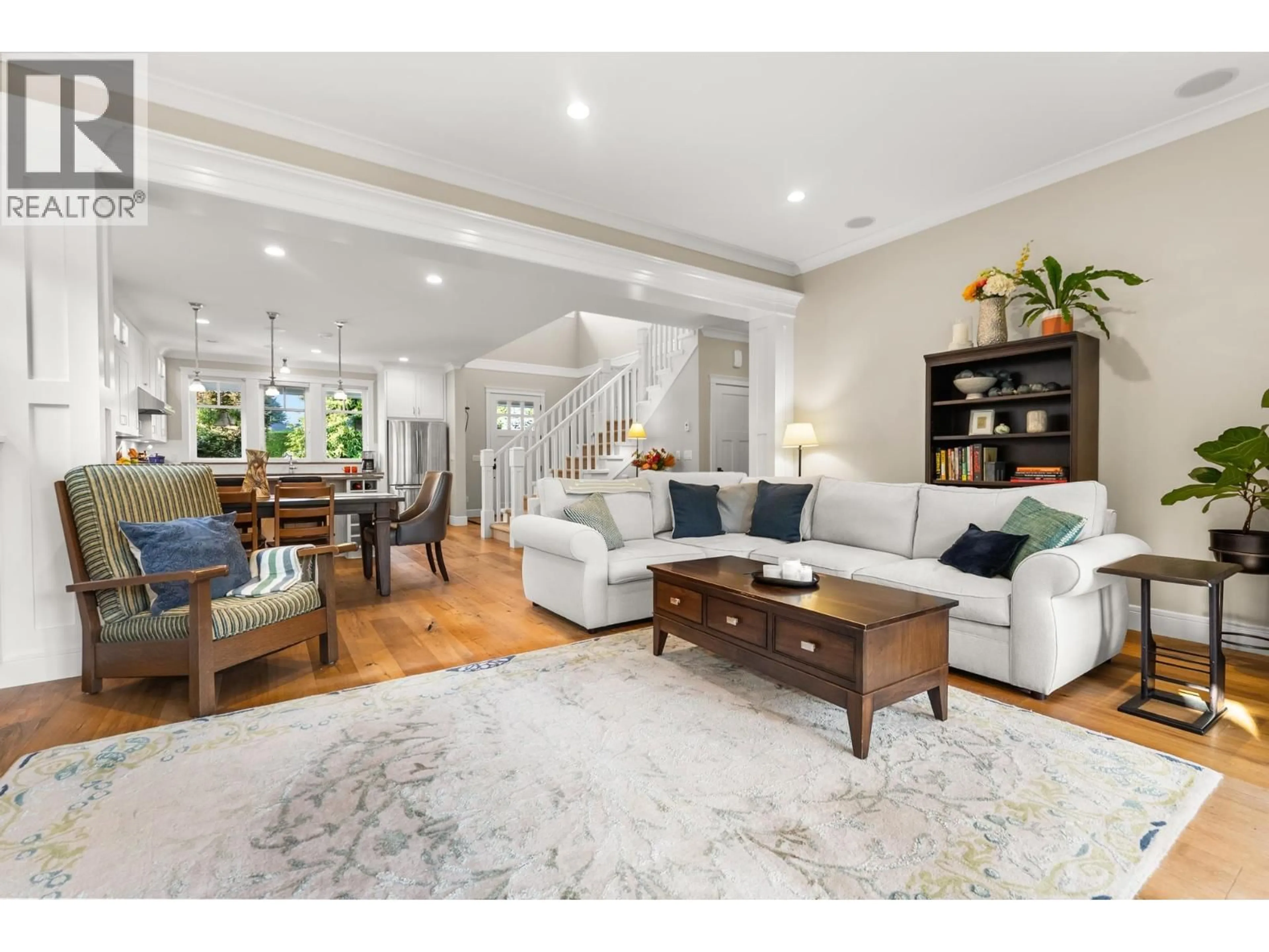 Living room with furniture, wood/laminate floor for 4896 12 AVENUE, Delta British Columbia V4M2A6